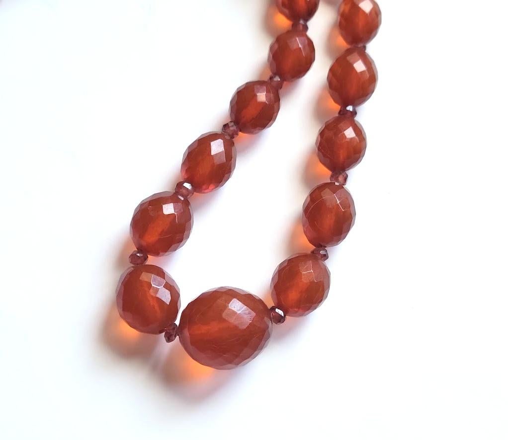 Antique Königsberg Baltic Amber Necklace

Genuine pre-war faceted Baltic amber
RARE elegant thread in perfect antique condition. Luxurious thin craquelure graduated beads. Weightless! Genuine Baltic amber hand-cut. Such amber is no longer made