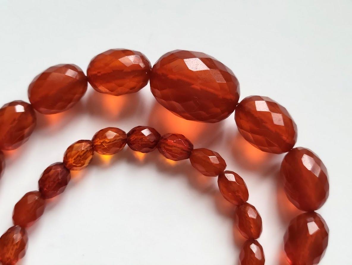 Genuine pre-war faceted Baltic amber
RARE elegant thread in perfect antique condition. Luxurious thin craquelure graduated beads. Weightless! Genuine Baltic amber hand-cut. Such amber is no longer made anywhere in the world.
100% Genuine Baltic