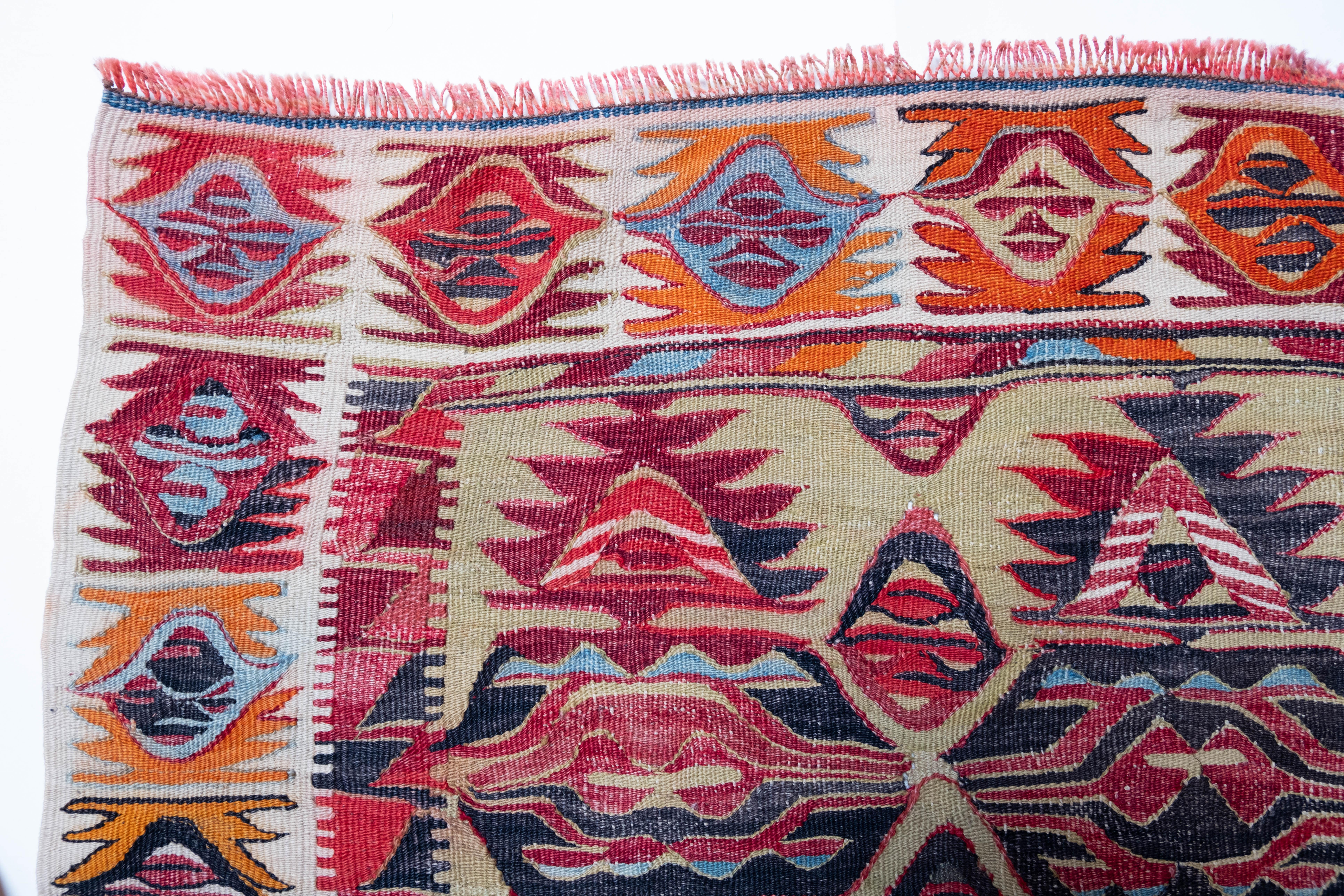 This is Central Anatolian Antique Kilim from the Hotamis, Konya region with a rare and beautiful color composition.

This highly collectible antique kilim has wonderful special colors and textures that are typical of an old kilim in good condition.
