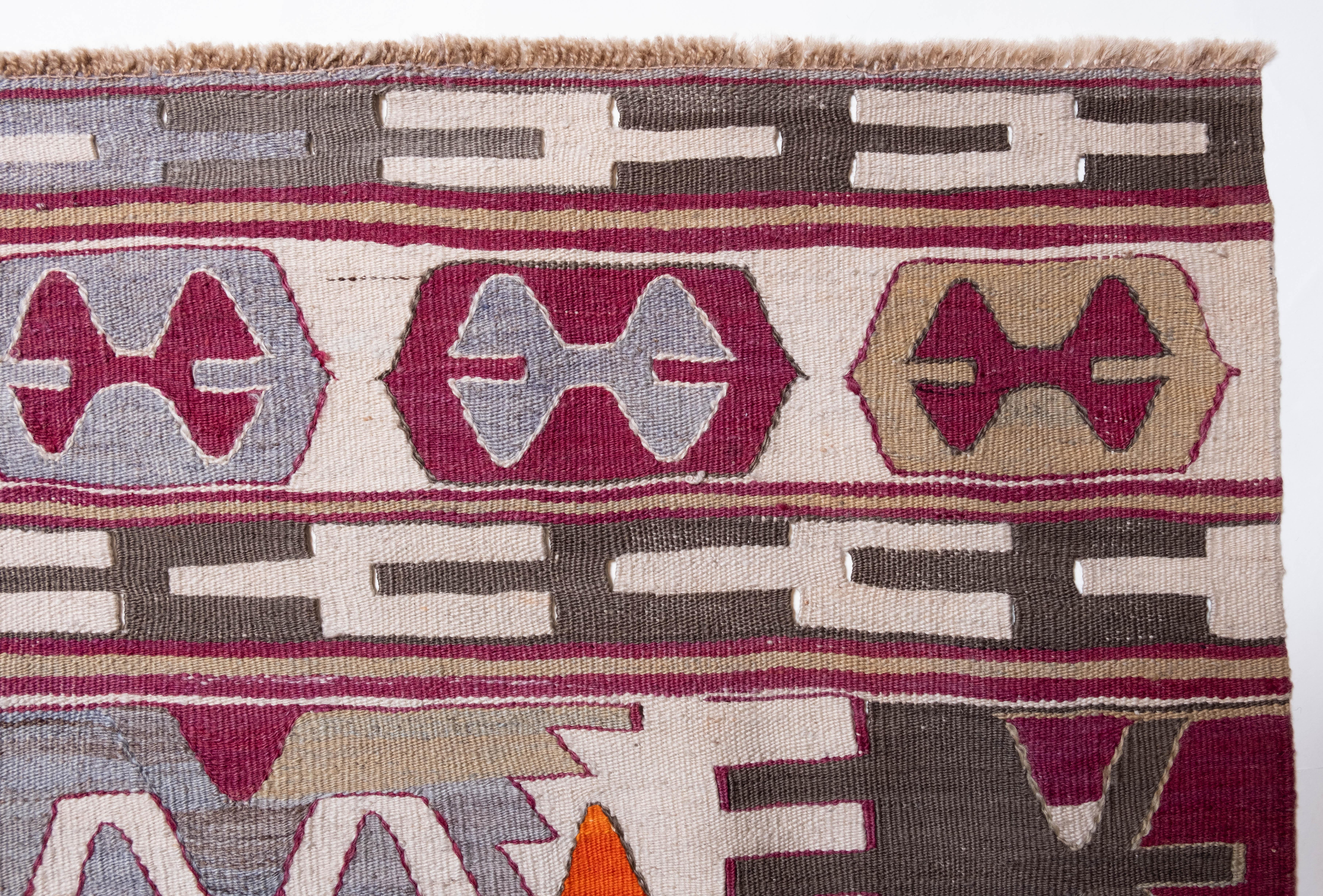 This is Central Anatolian Antique Kilim from the Konya region with a rare and beautiful color composition.

This highly collectible antique kilim has wonderful special colors and textures that are typical of an old kilim in good condition. It is a