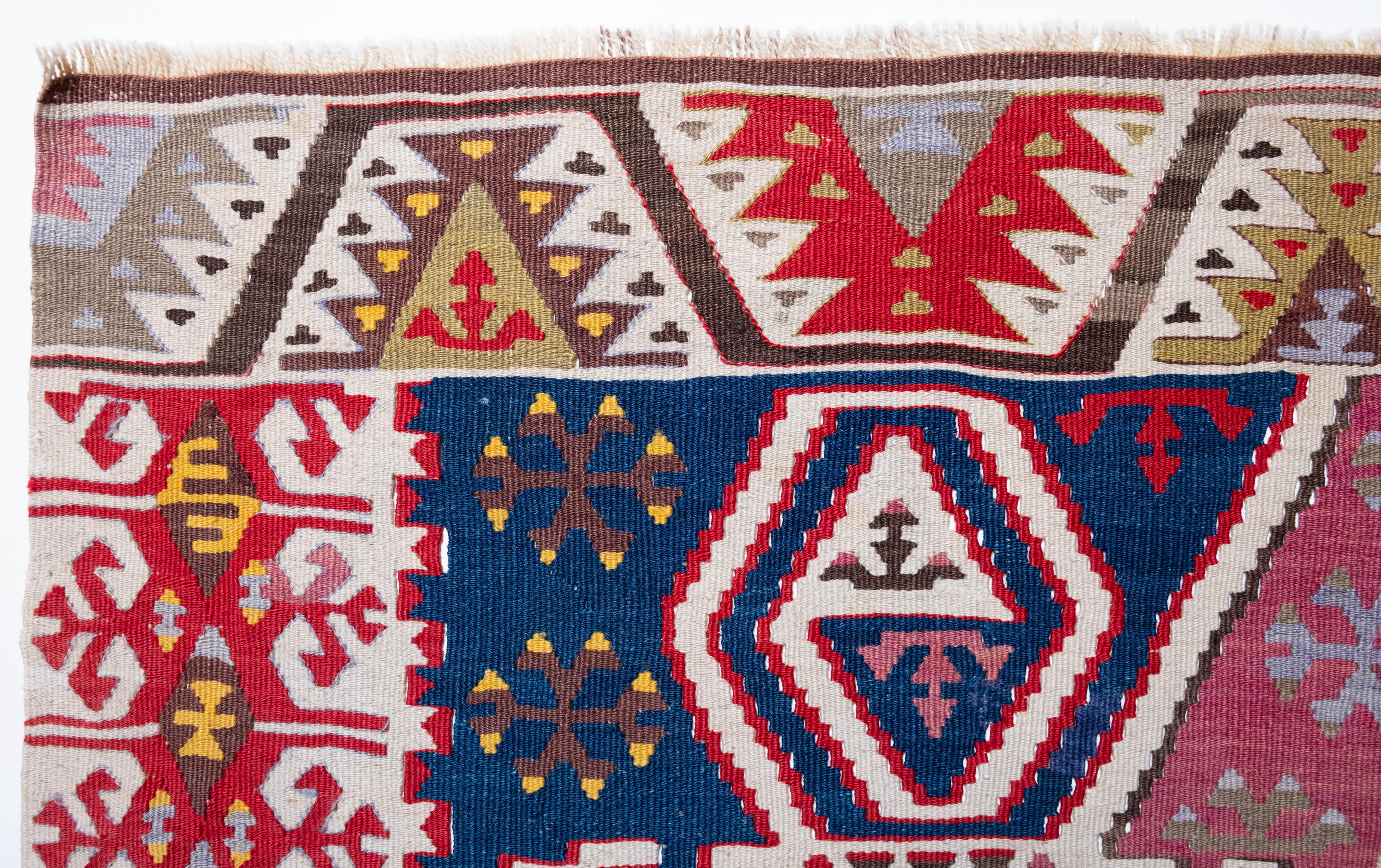 This is Central Anatolian Antique Kilim from the Konya region with a rare and beautiful color composition.

This highly collectible antique kilim has wonderful special colors and textures that are typical of an old kilim in good condition. It is a