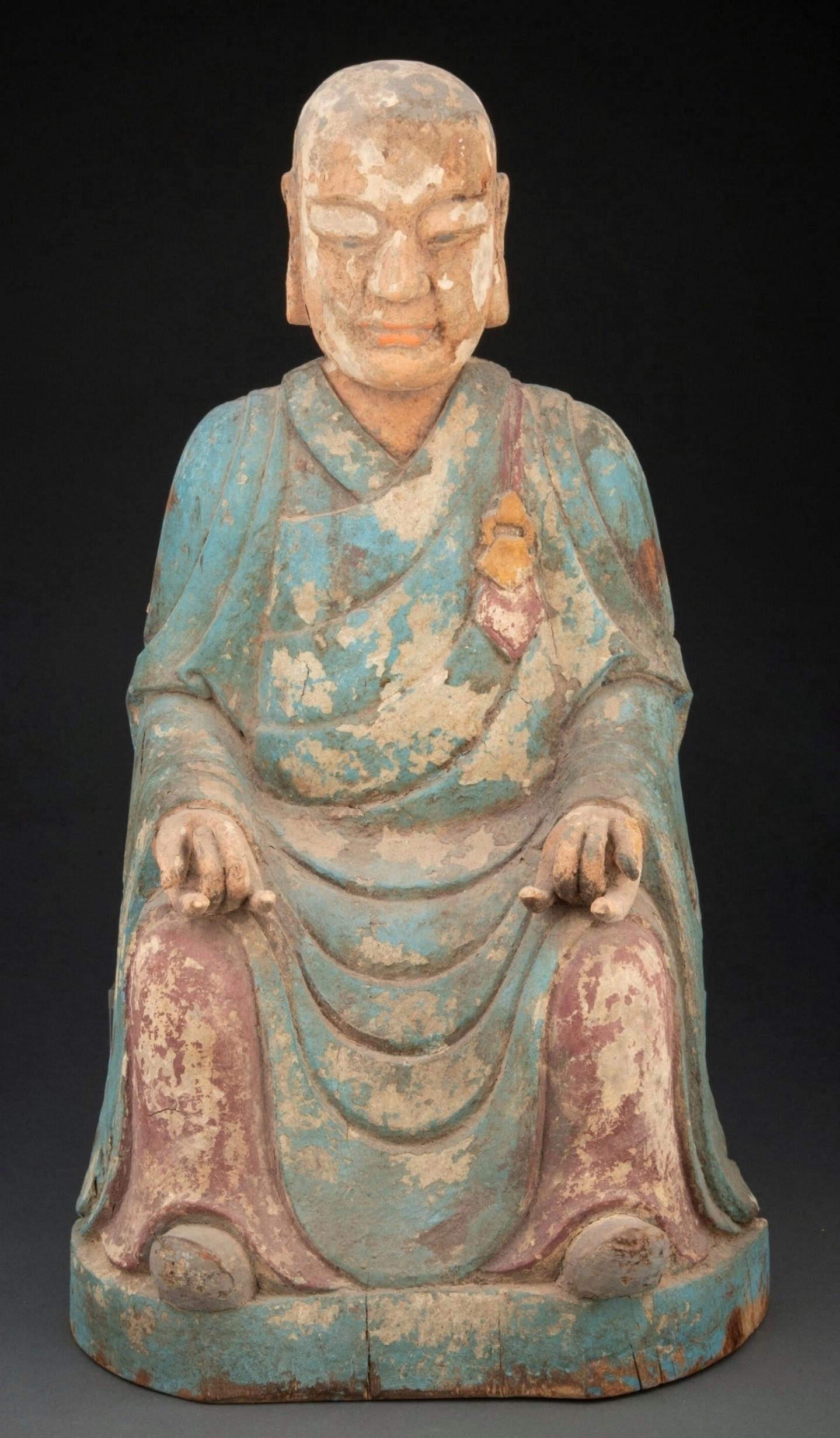 Bring a touch of peaceful tranquil serenity and help ward off sickness and negative energy with this large Joseon dynasty (1392–1910) antique Asian hand carved and painted wood Buddhist figure.

Dating to the 18th/19th century, Korea, retaining the