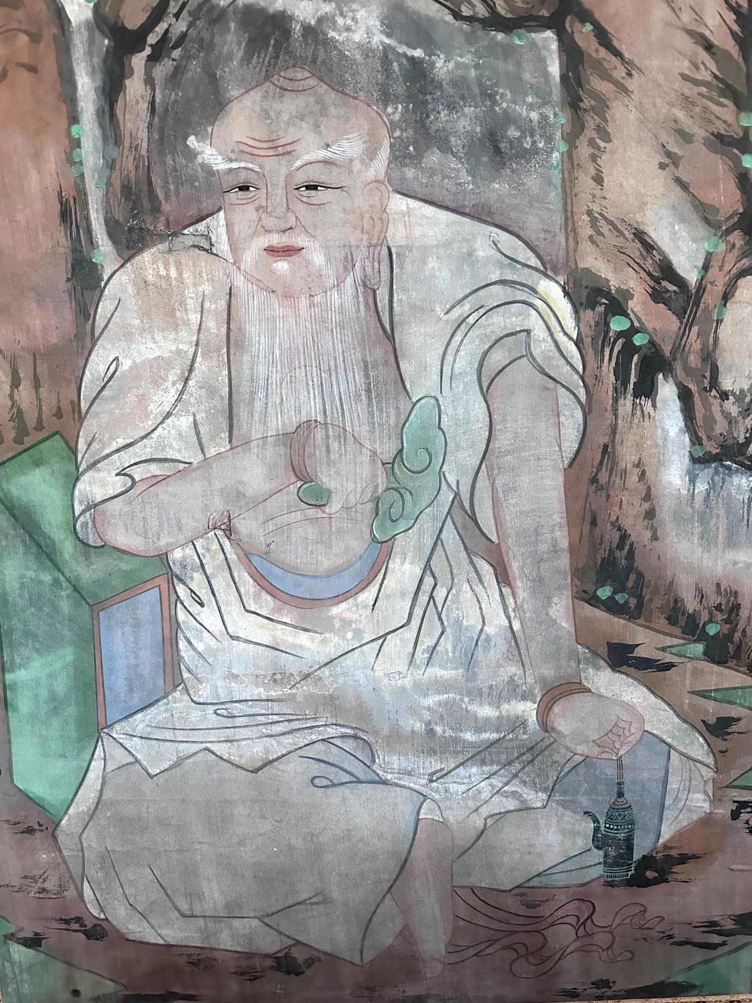 An antique Korean folk painting of an old sage meditating among rocks under an ancient pine tree with a flying crane circa 19th century late Joseon period. The image was likely part of a larger scroll that depict of Mountain Spirit (Sansin in