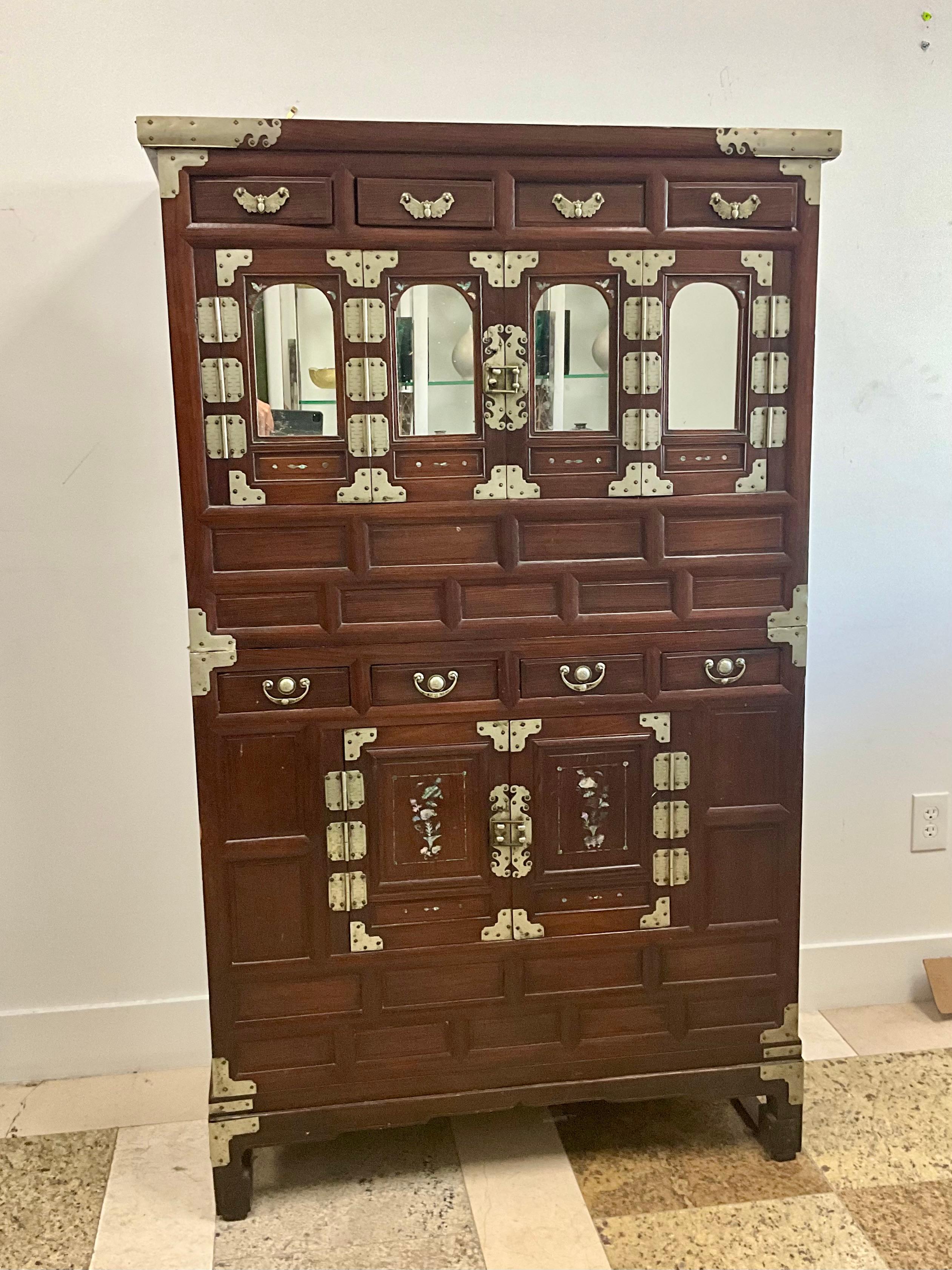 Antique Korean Jang Chest-on-Chest with Stand - Early 20th Century

This stunning antique Korean jang chest-on-chest, crafted in the early 20th century, features a beautifully designed wooden stand. Originally intended for storing folded clothing,