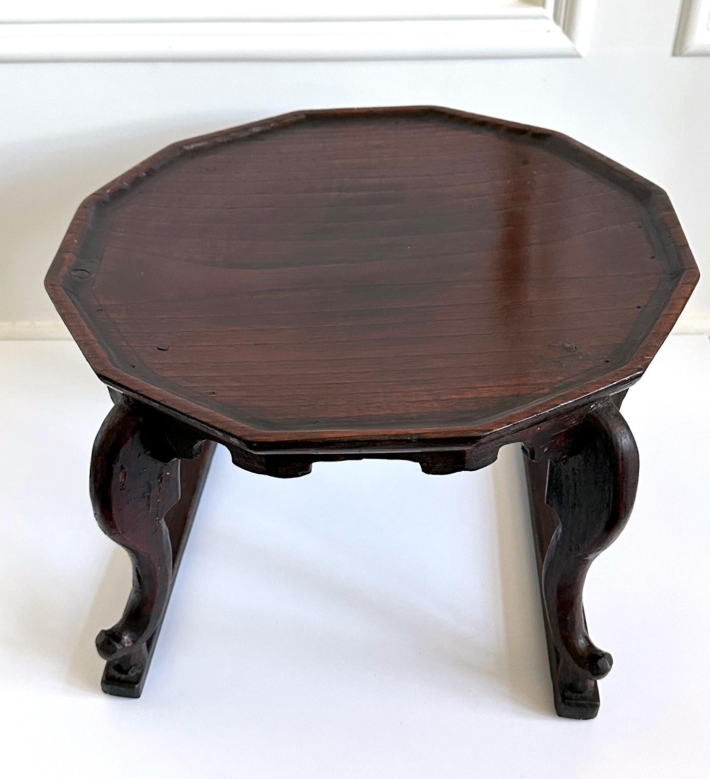 An antique wood table from Korea from late 19th century (end of Joseon Dynasty). This type of light weight table is called 