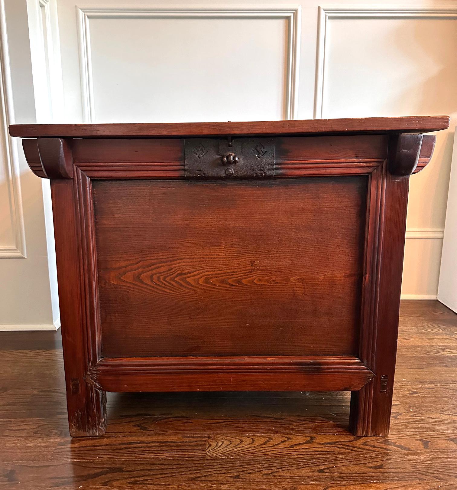 A square-form chest from Korea circa end of 19th to early 20th century (End of Joseon to Korean Empire period). The sturdy bin-like piece supported by unadorned block feet was made from solid elm (Zelkova) and pine wood. Traditionally, it was used