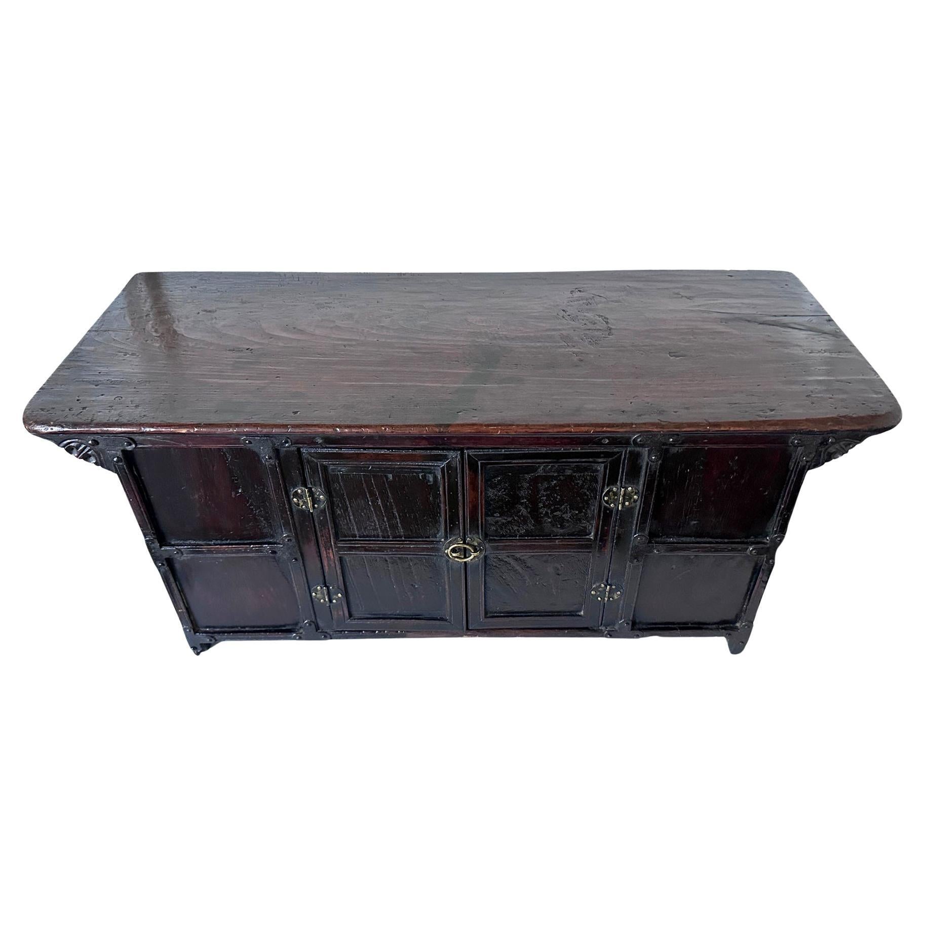 Known as Ch'aeksang or Soan, this small Korean desk was made from zelkova wood (Korean Elm) and supplement with simple brass hardware fittings. The piece is dated circa early to mid-19th century possibly earlier (Joseon period). Served primary as a