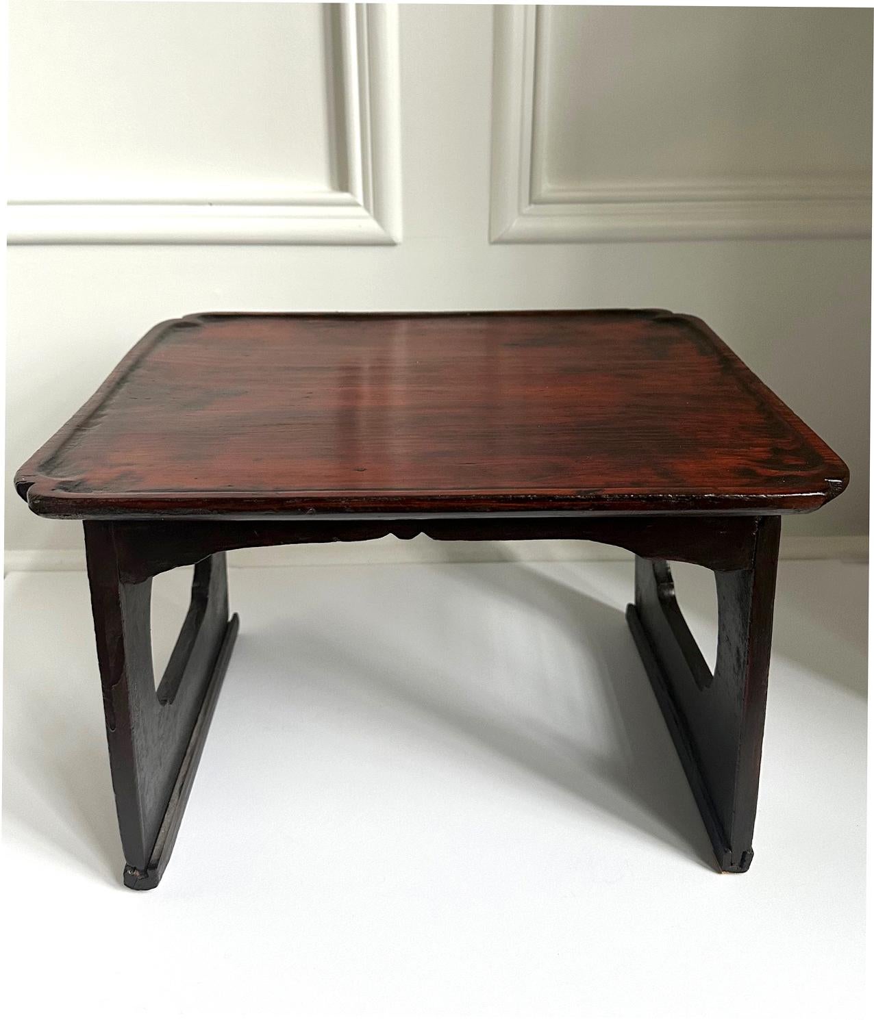 A small rectangular wood table from Korea circa late 19th century of Joseon Dynasty. Known as Soban (small plate), this type of light weight table was used primarily as individual dining table to present and serve foods, but also as small desk,