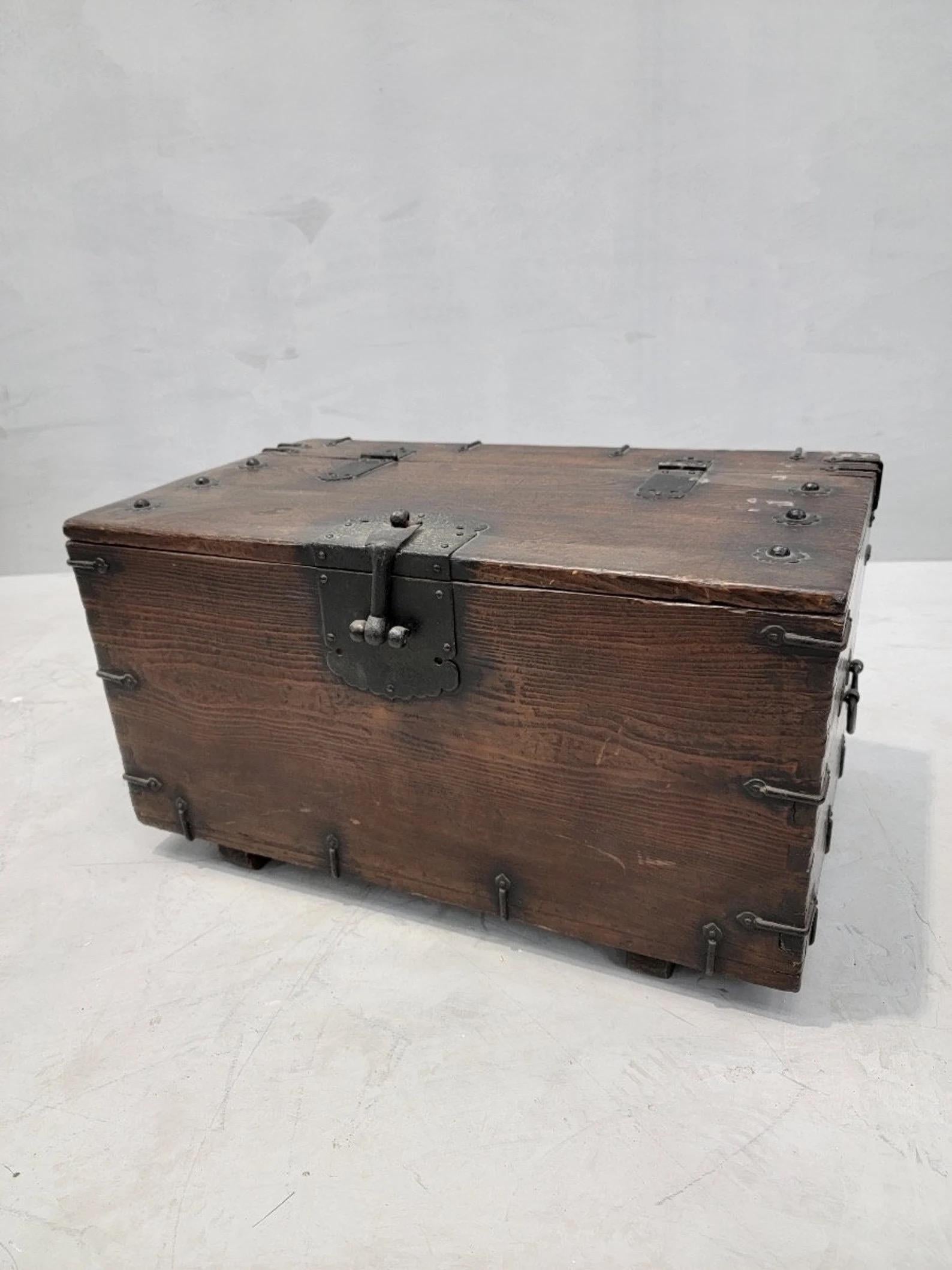 Antique Korean Tansu Bandaji Storage Chest

Featuring an antique Korean Tansu Bandaji Chest with iron hardware. Stunning piece of furniture that dates back to the early 1900s. Historically significant as it was very popular amount Aristocrats during
