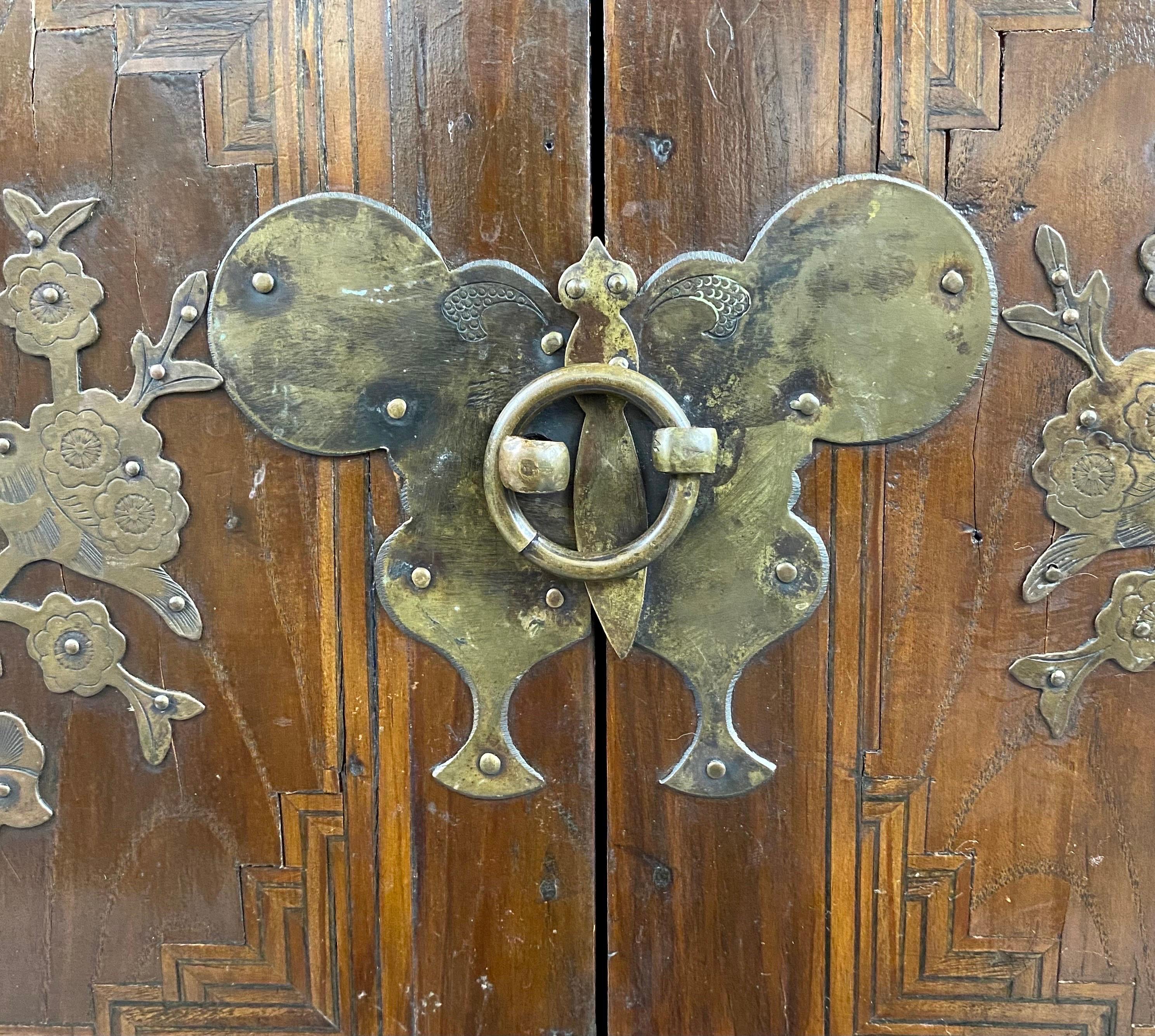 Hand-Carved Antique Korean Tansu Butterfly Cabinet or Chest Elm Wood with Brass Inlay For Sale