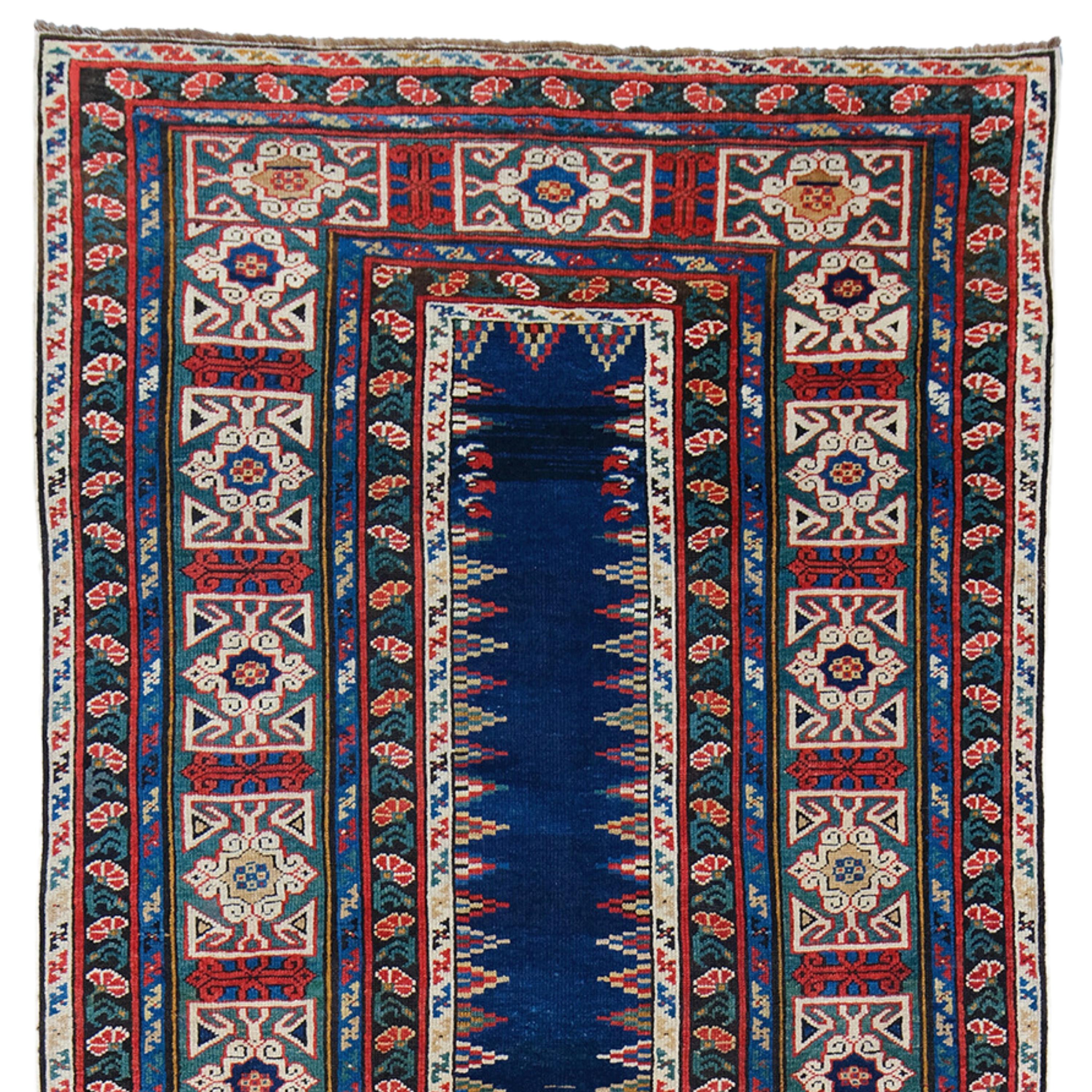 19th Century Caucasian Rug - Handmade Wool Rug

An excellent choice for decorating your dream home, this antique carpet was woven in the Kuba region of the Caucasus in the late 19th century. This region is known as one of the most important centers