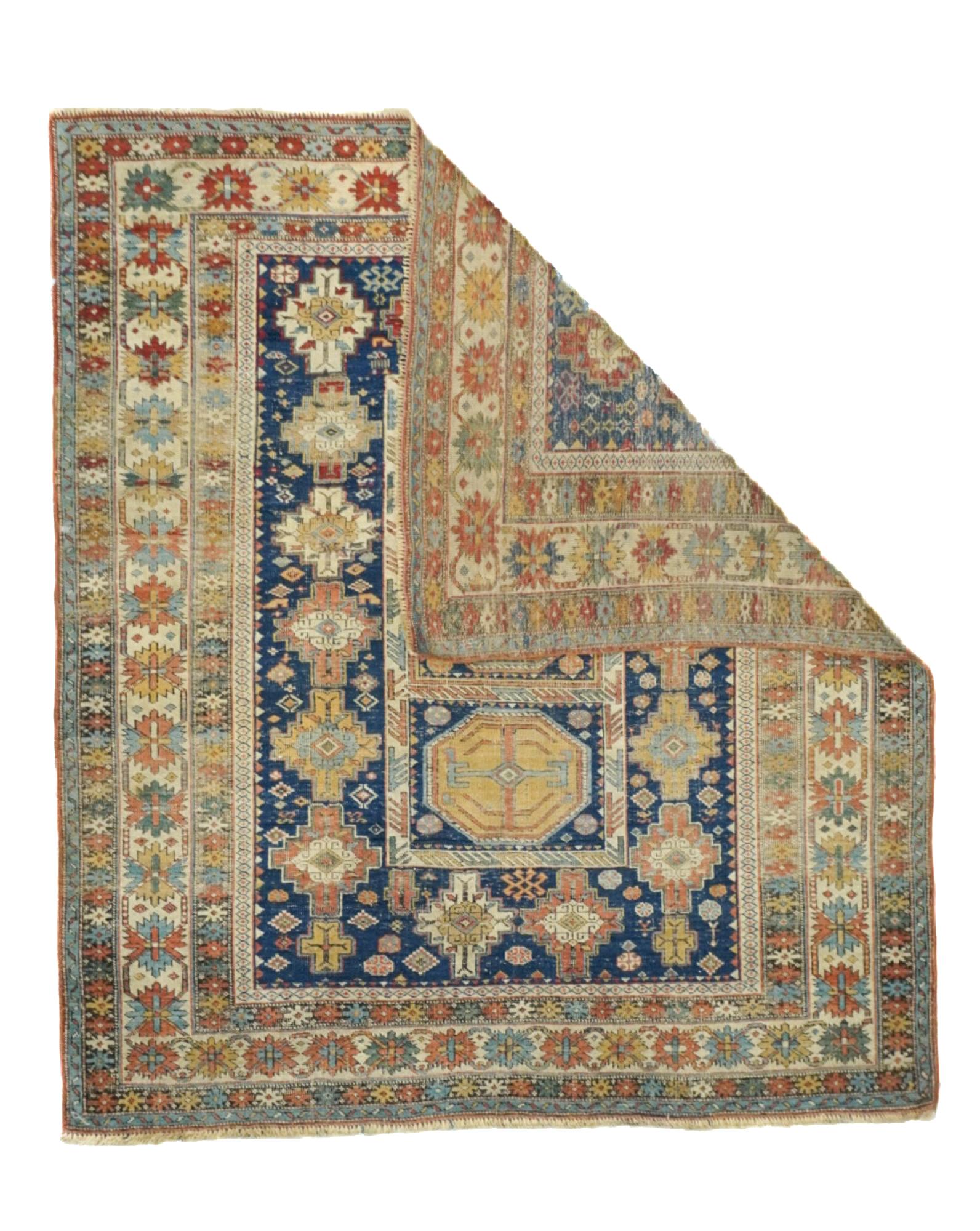 Antique Kuba Rug 3'10'' x 4'5''. Azeri Turks inhabit the Kuba area of the central west Caspian Caucasus and weave a wide variety of geometric scatters, runners, long rugs and niche (prayer) pieces, in geometric allover and medallion designs. Some