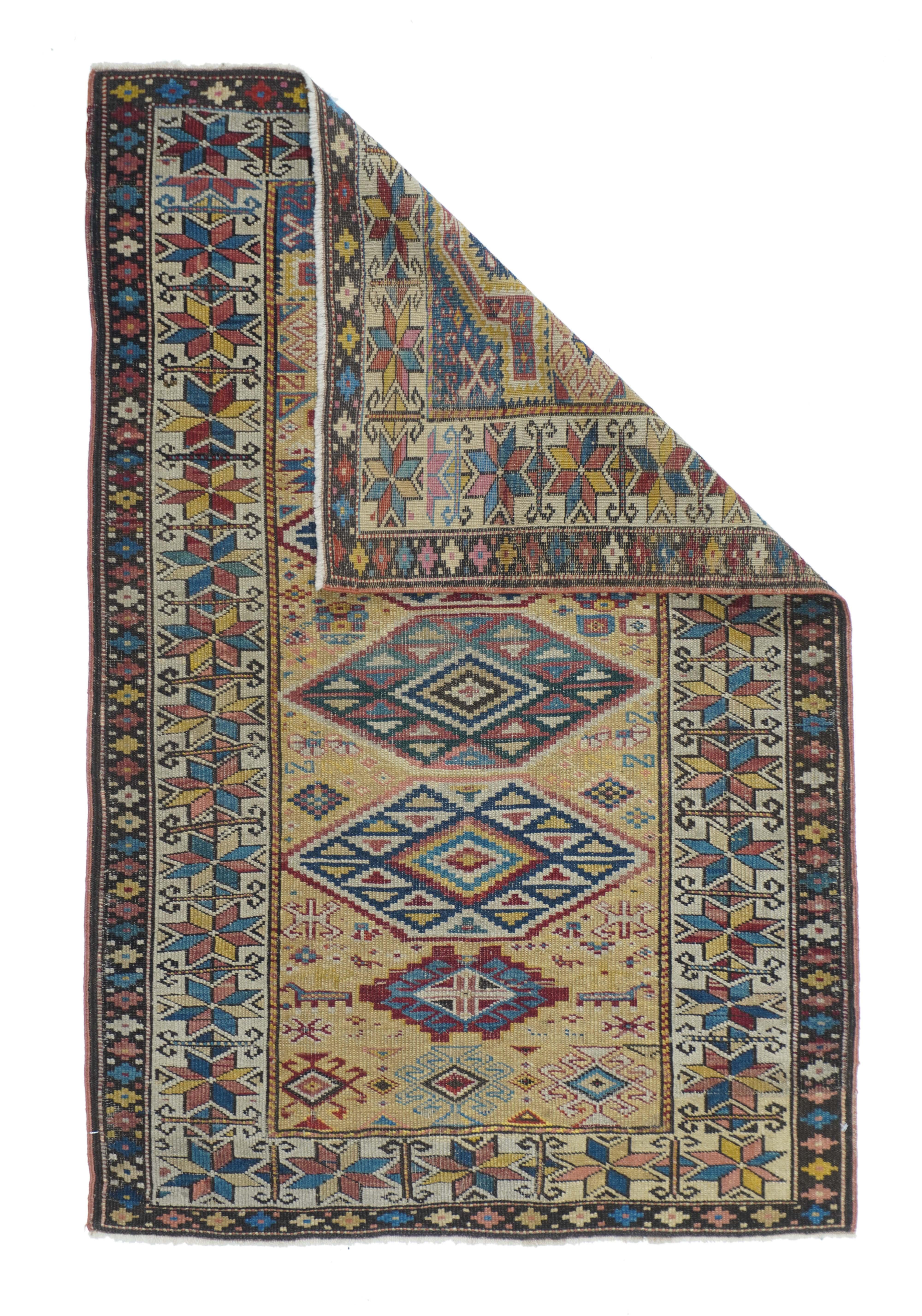 Tapis Kuba antique 3'2'' x 4'9''.