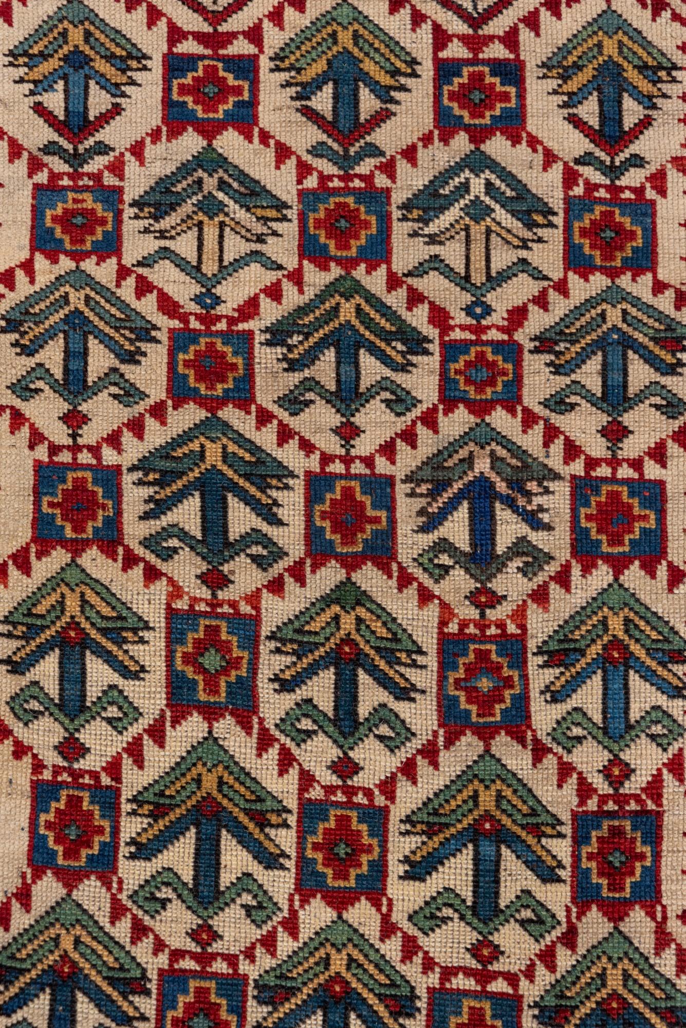 Hand-Knotted Antique Kuba Rug with Red Border and Diamond Design For Sale