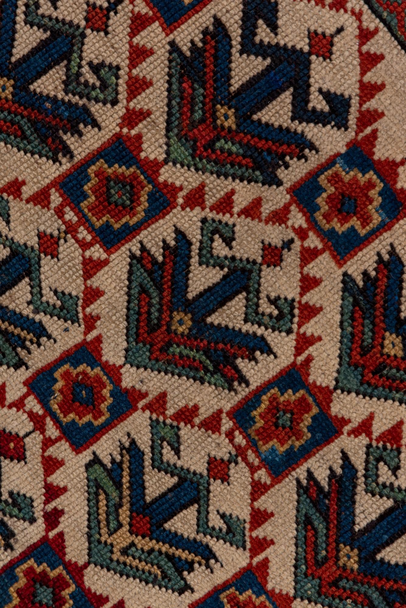 Antique Kuba Rug with Red Border and Diamond Design In Good Condition For Sale In New York, NY