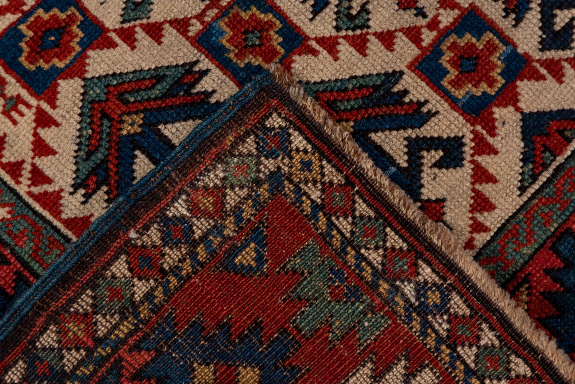 20th Century Antique Kuba Rug with Red Border and Diamond Design For Sale
