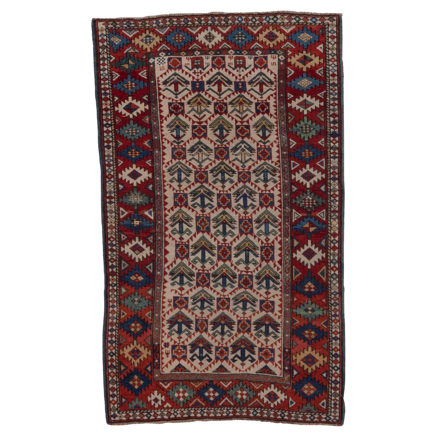 Antique Kuba Rug with Red Border and Diamond Design For Sale
