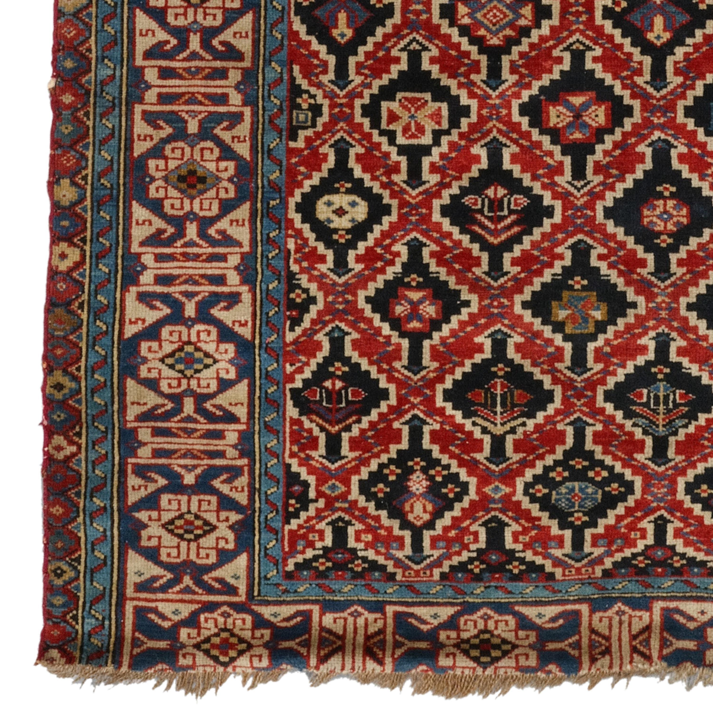 Middle Of The 19th Century Caucasian Kuba Shirvan Rug
Size 105 x 125 cm (3,44 - 4,1 ft)

Add Color and Culture to Your Home: 19th Century Caucasian Kuba Shirvan Carpet

Would you like to add both color and culture to the decoration of your home?