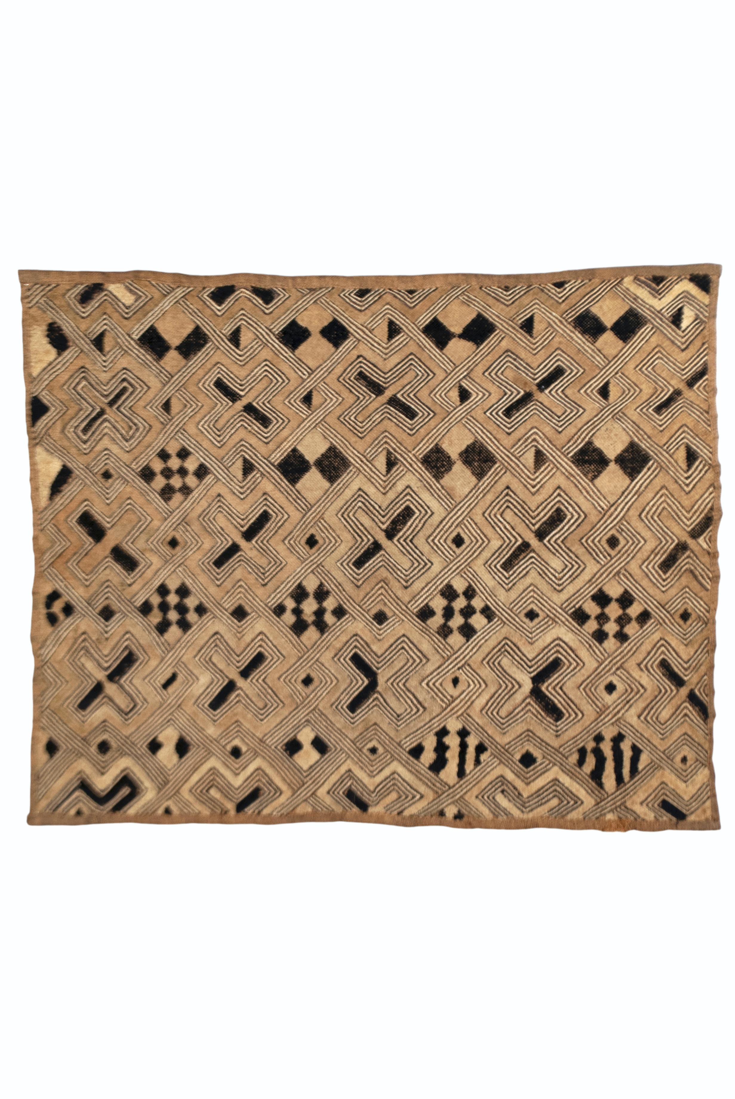 Antique Kuba Shoowa Cut-Pile & Embroidered Cloth, DR Congo

A graphically compelling example of a Kuba raffia fiber prestige cloth with cut pile and stitched embroidery. In very good condition.
Mid 20th C
Width 28.5 inches, Height: 23 inches



