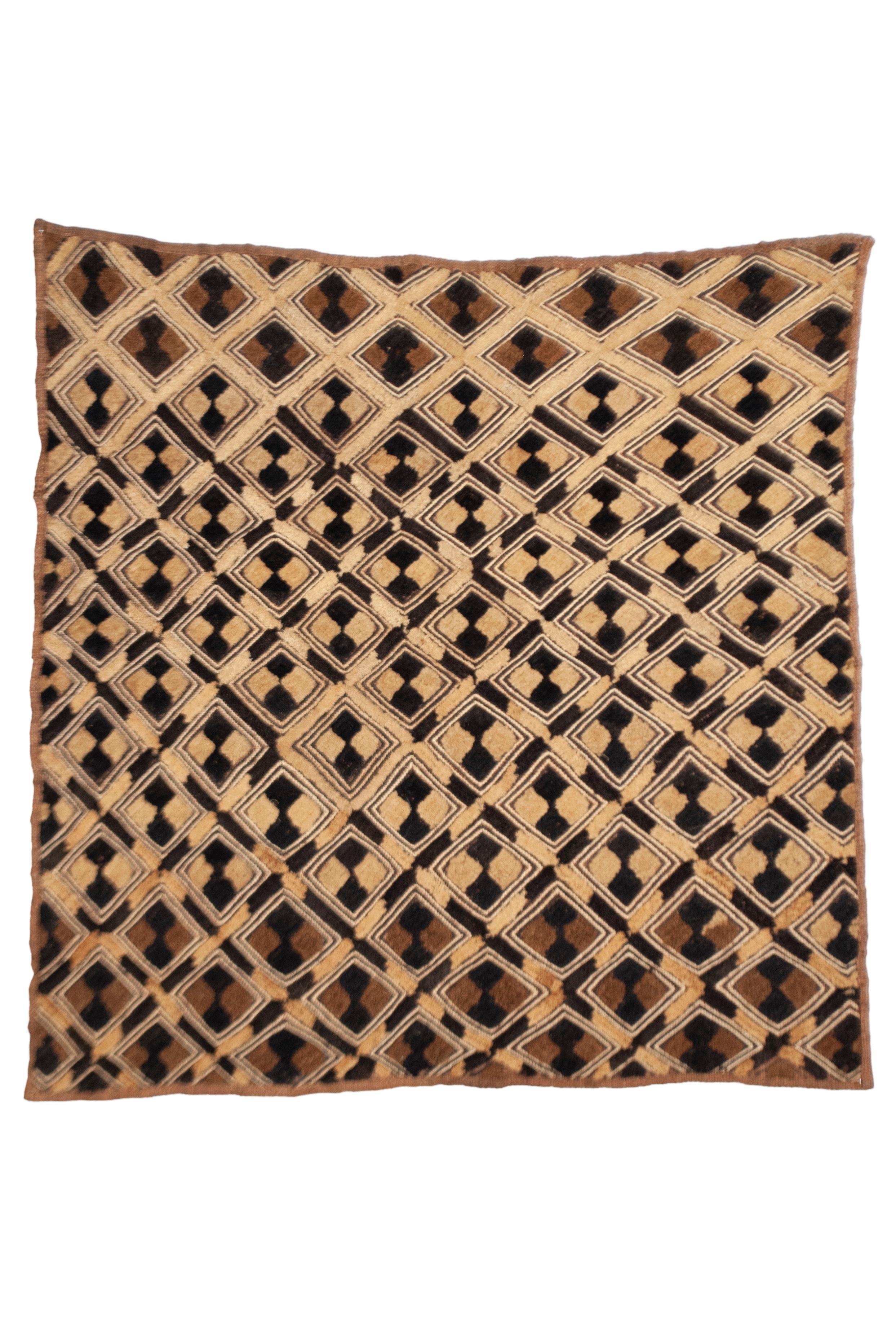 Antique Kuba Shoowa Cut-Pile & Embroidered Cloth, DR Congo

A graphically compelling example of a Kuba raffia fiber prestige cloth with cut pile and stitched embroidery. In very good condition.
Mid 20th C
Width 25 inches, Height: 26 inches


