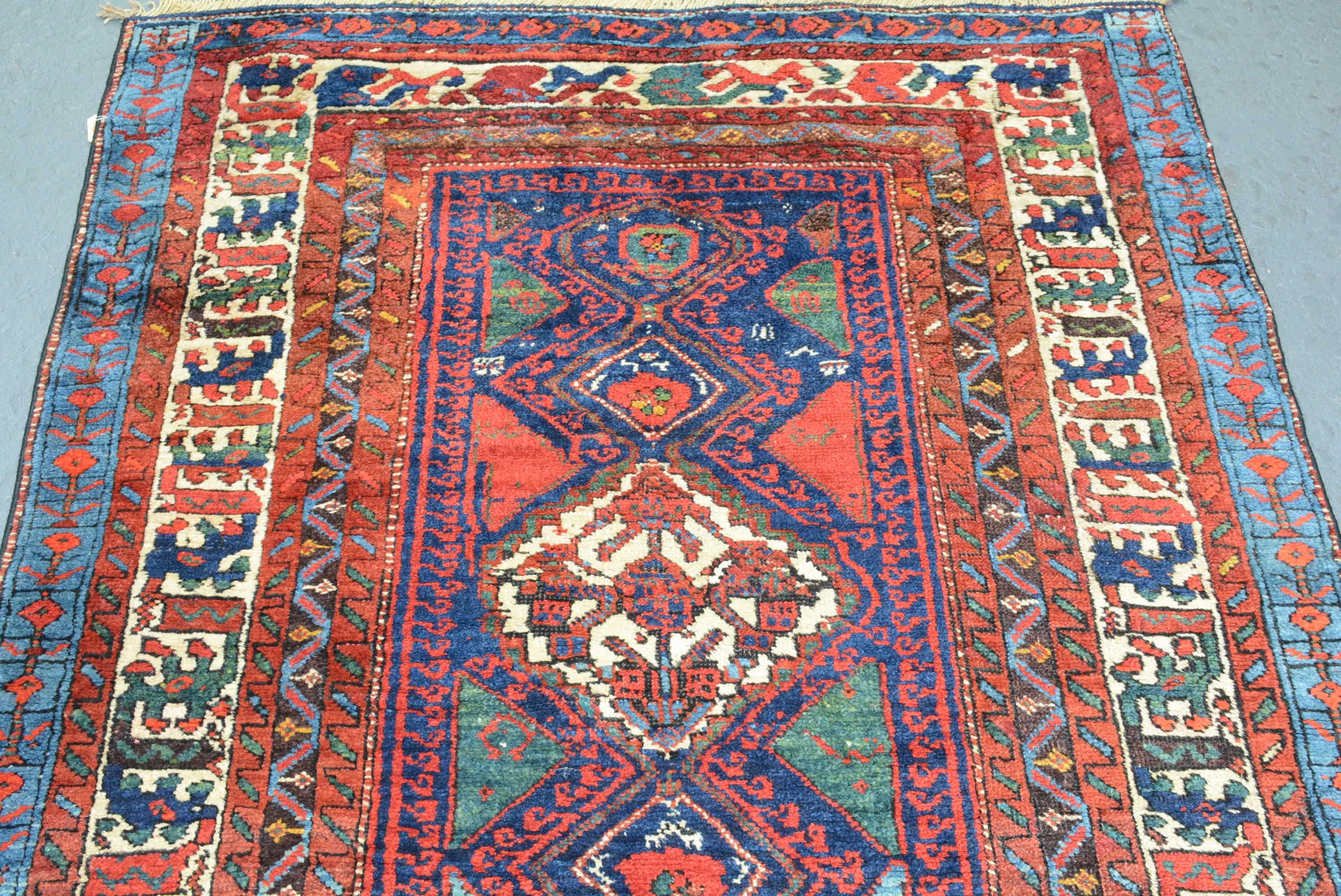 This graphic Bidjar rug woven by the Kurdish population in northern Persia has a wool foundation. Circa 1900, Measures: 5' 2