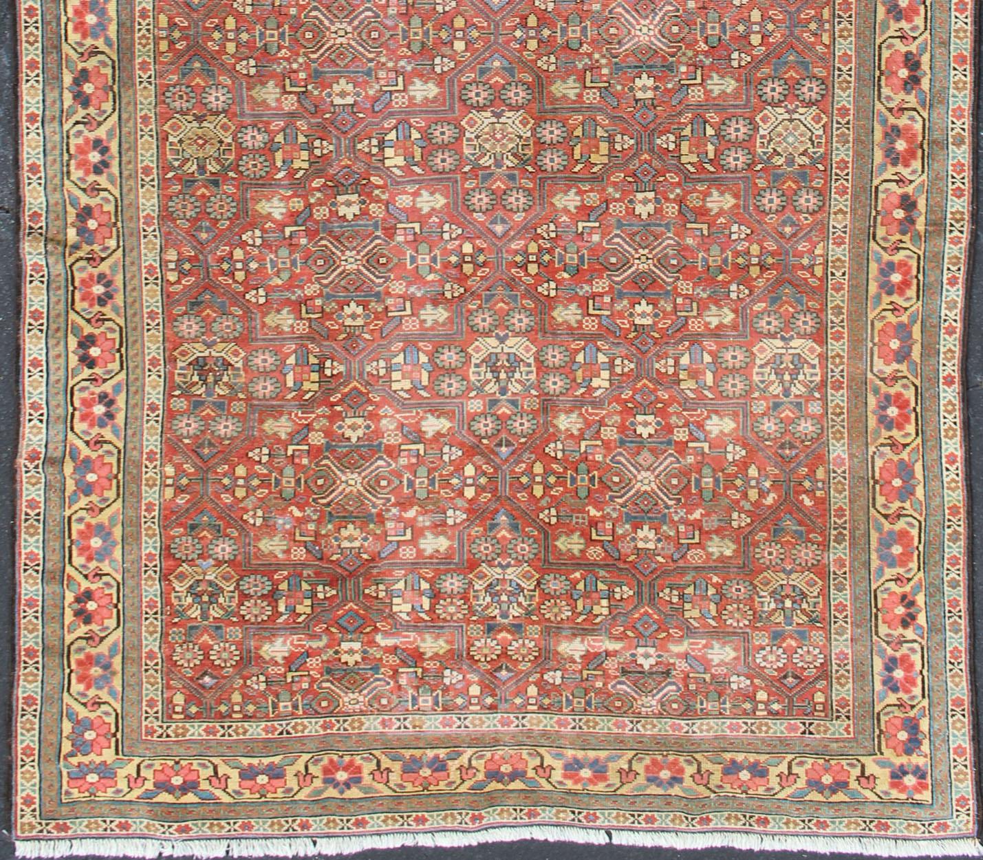 Geometric design antique Kurdish Gallery runner, rug / L11-0301. Kurdish Gallery rug
This antique Kurdish Gallery piece features an intricate and geometric pattern, with colors ranging from soft rusty red, gorgeous blues, pale green, yellow, cream