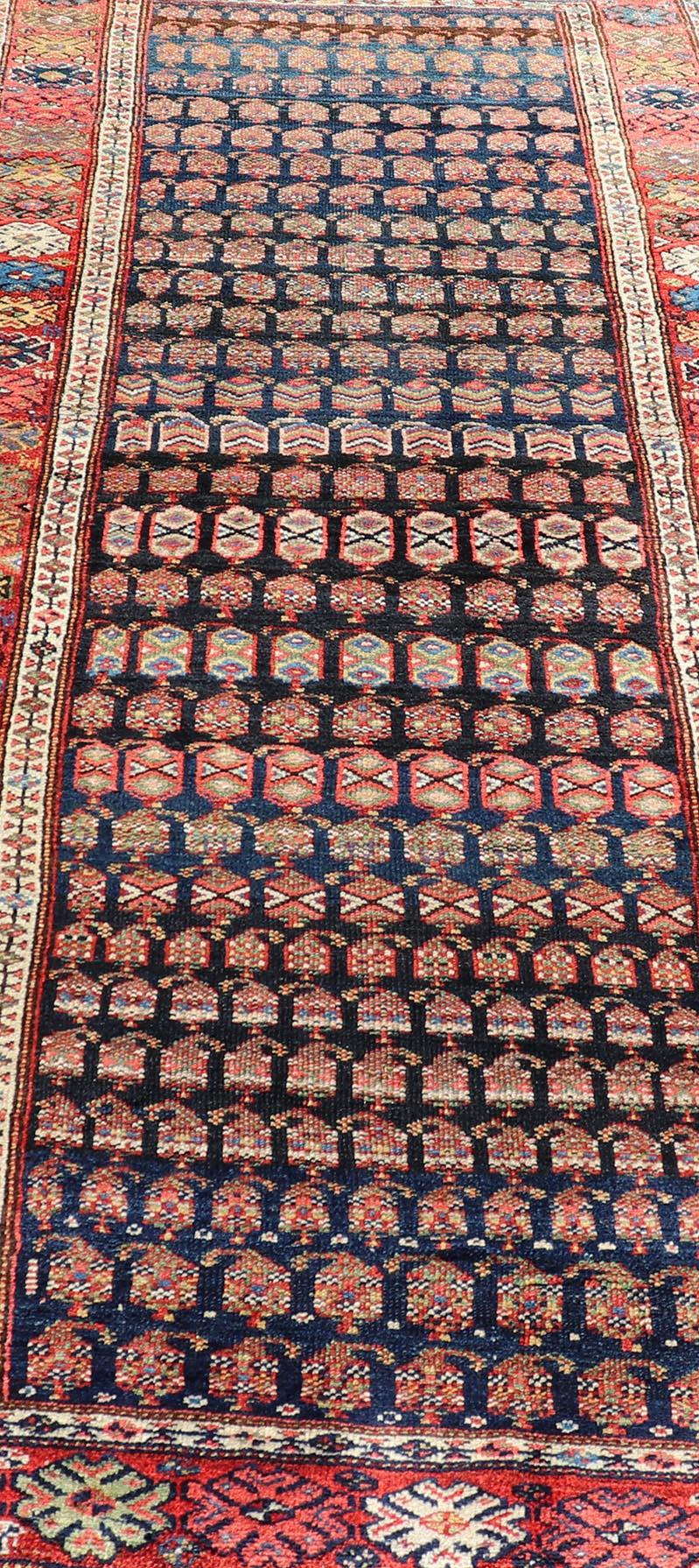 Tribal Antique Kurdish Gallery Runner In All-Over Geometric Design on a Blue Background For Sale
