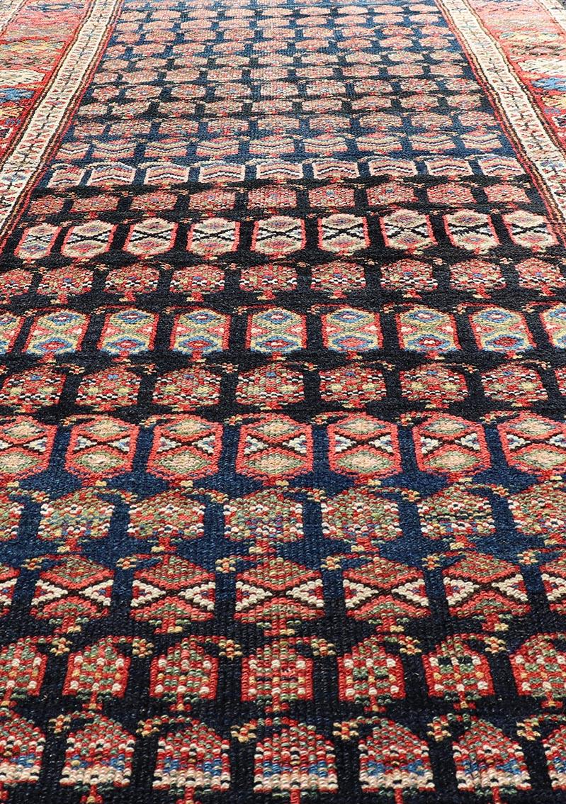 Persian Antique Kurdish Gallery Runner In All-Over Geometric Design on a Blue Background For Sale