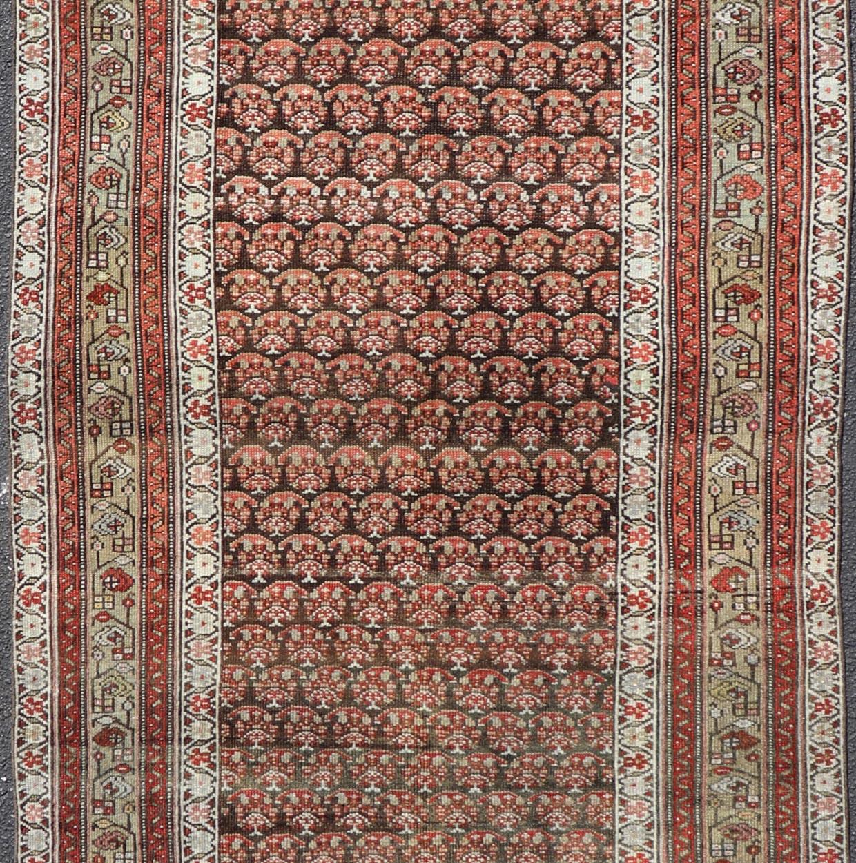 Hand-Knotted Antique Kurdish Gallery Runner with All-Over Paisley Design in Brown, Red, Green For Sale