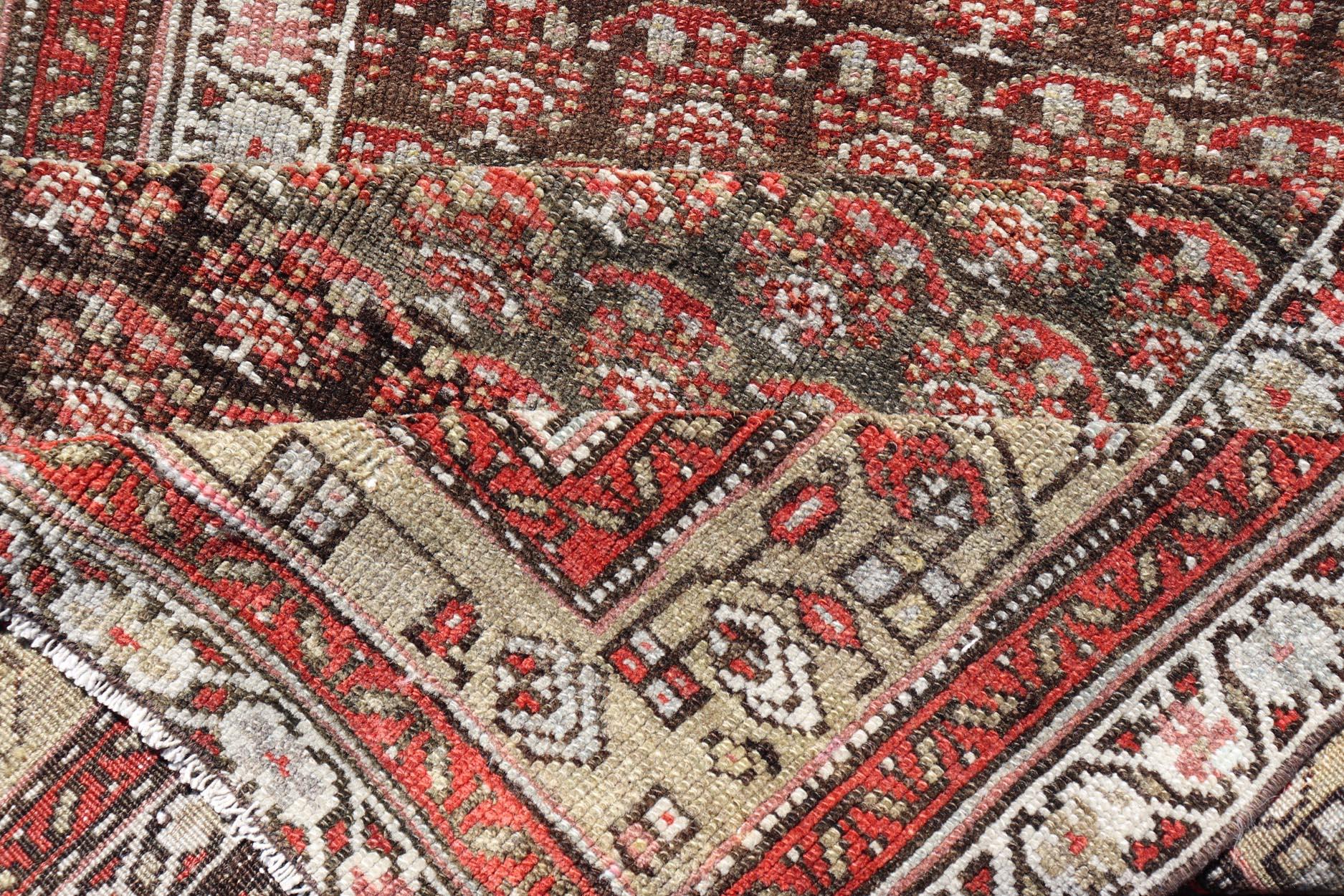 Wool Antique Kurdish Gallery Runner with All-Over Paisley Design in Brown, Red, Green For Sale