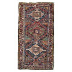 Tapis kurde kazak antique 5'5'' x 9'10'' (en anglais)