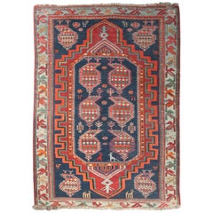 Antique Kurdish Kazak Tribal Rug with Stylized Animals, circa 1910