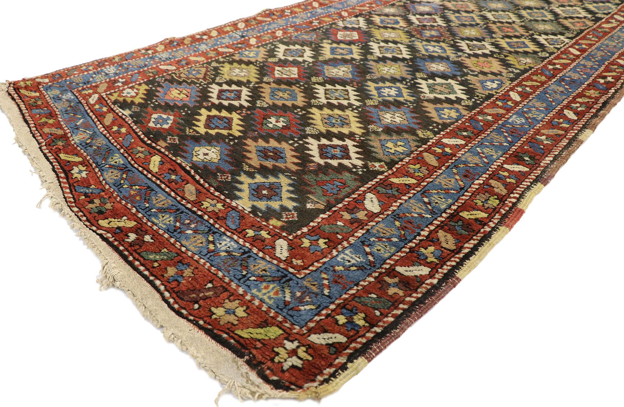 73255, antique Kurdish Persian Hallway runner with Modern Tribal style 03'02 x 13'08. Reflecting extraordinary detail and modern tribal style with an intimate patina, this hand knotted wool antique Kurdish Persian runner features an all-over