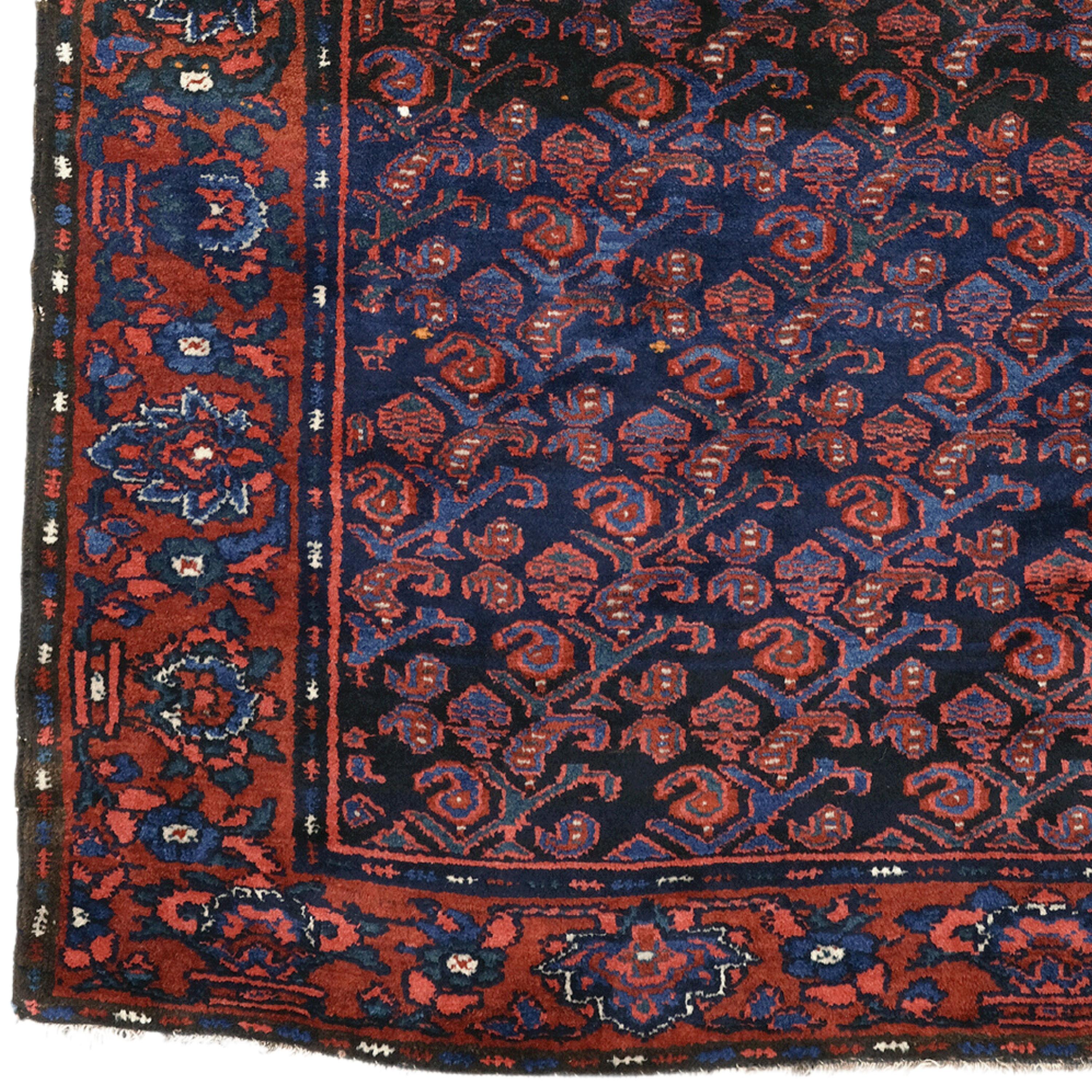 This elegant 19th-century Kurdish rug will add nobility to every corner of your home with its carefully woven details and rich color palette. This unique piece, reflecting the Ottoman period, is one of the most beautiful examples of