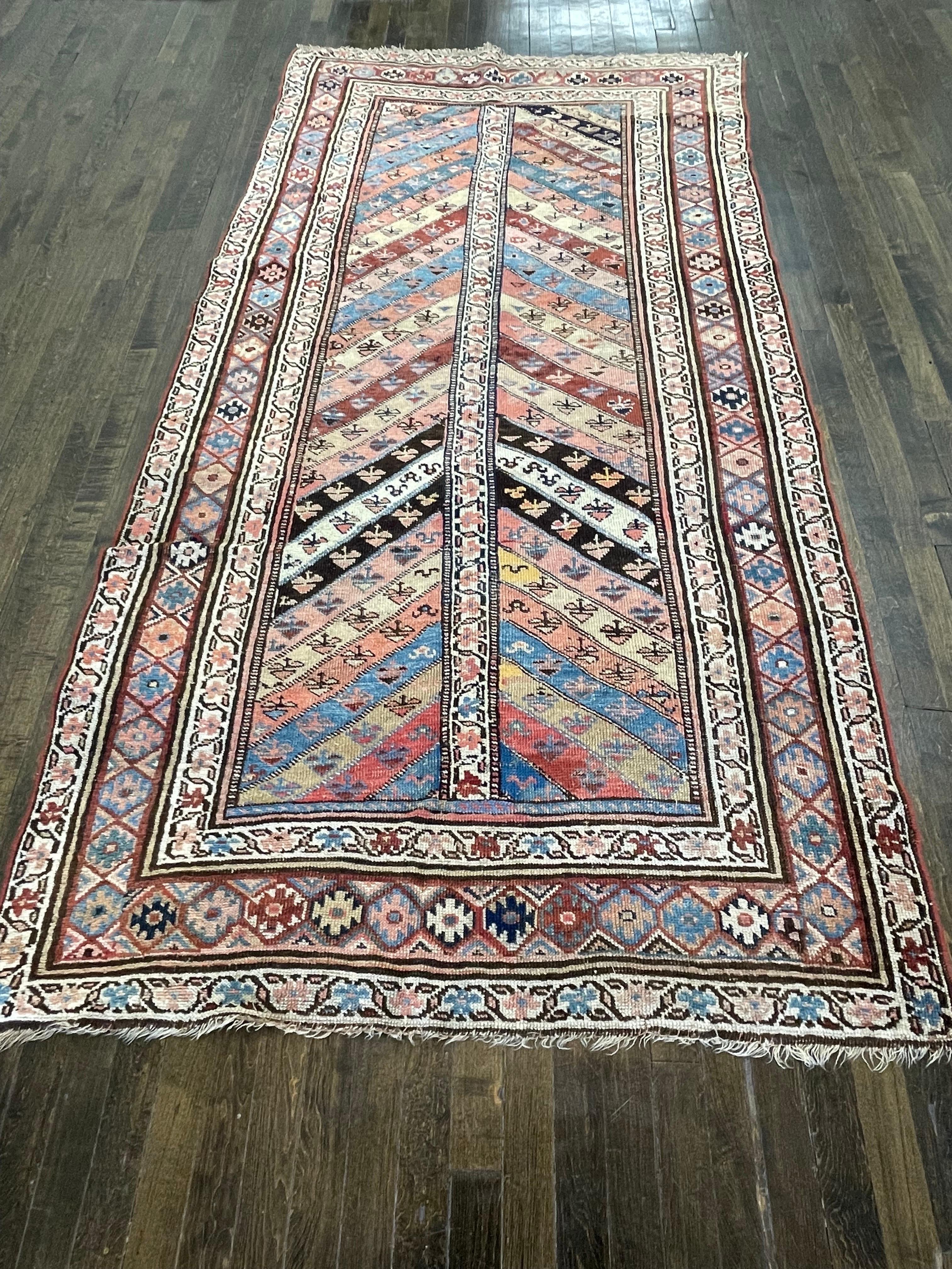 Handwoven in Kurdistan located in Iran's west ,this excellent example of Kurdish weaving is made in traditions of rug making of caucuses particularly of the Tallish region

Made with high quality wool that is dyed with all organic elements, this