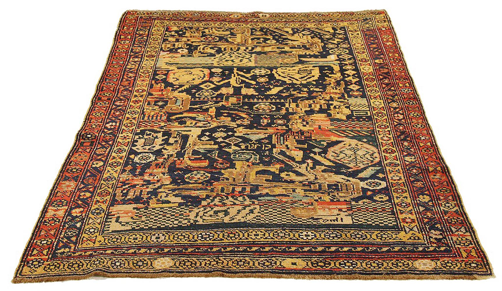 Antique Persian rug handwoven from the finest sheep’s wool and colored with all-natural vegetable dyes that are safe for humans and pets. It’s a traditional Kurdish design highlighted by large and small tribal details in navy, yellow and black. It’s