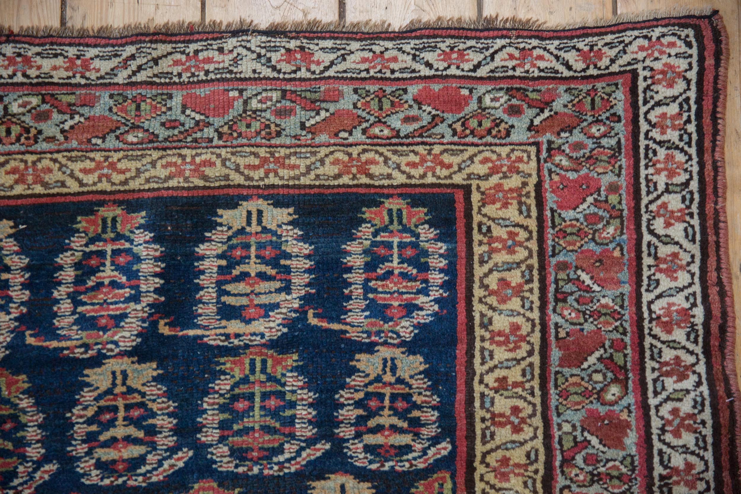 Alfombra antigua kurda Runner siglo XX en venta
