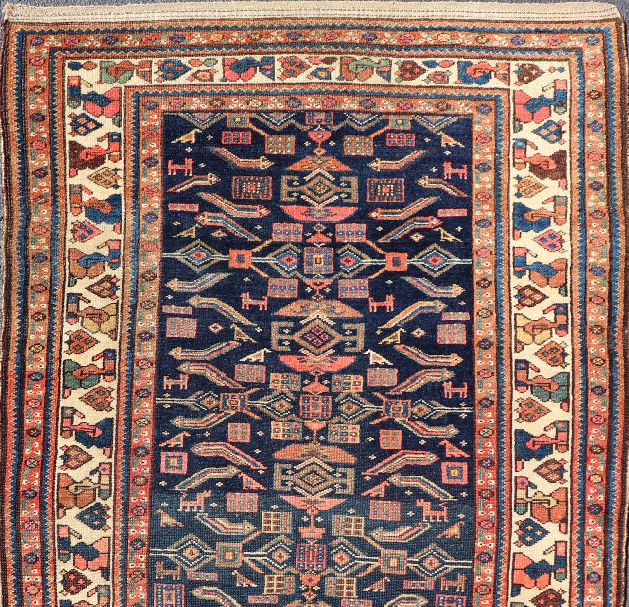 Persian Antique Kurdish Rug With All-Over Geometric Design on a Blue Background For Sale
