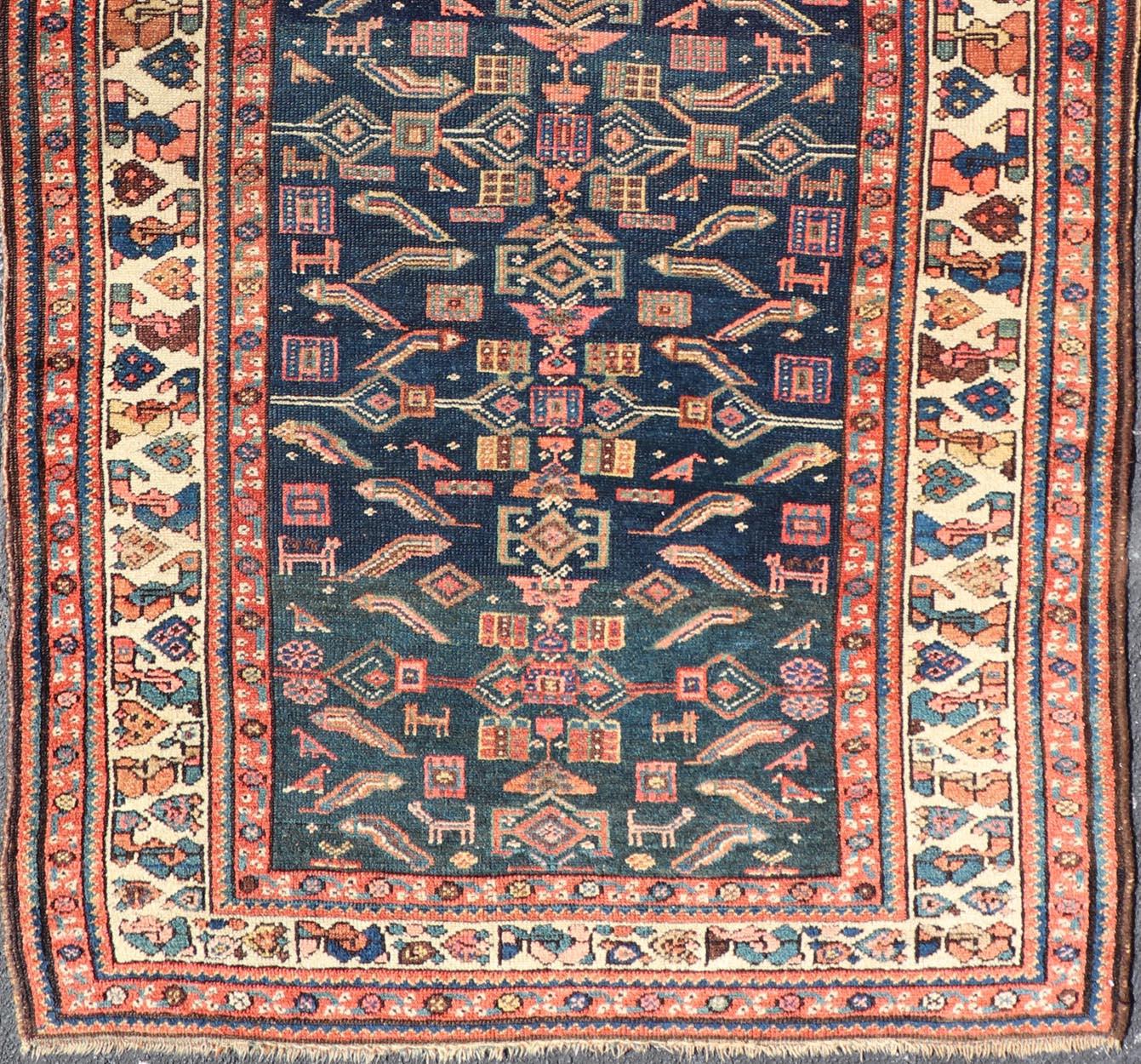 Antique Kurdish Rug With All-Over Geometric Design on a Blue Background In Good Condition For Sale In Atlanta, GA