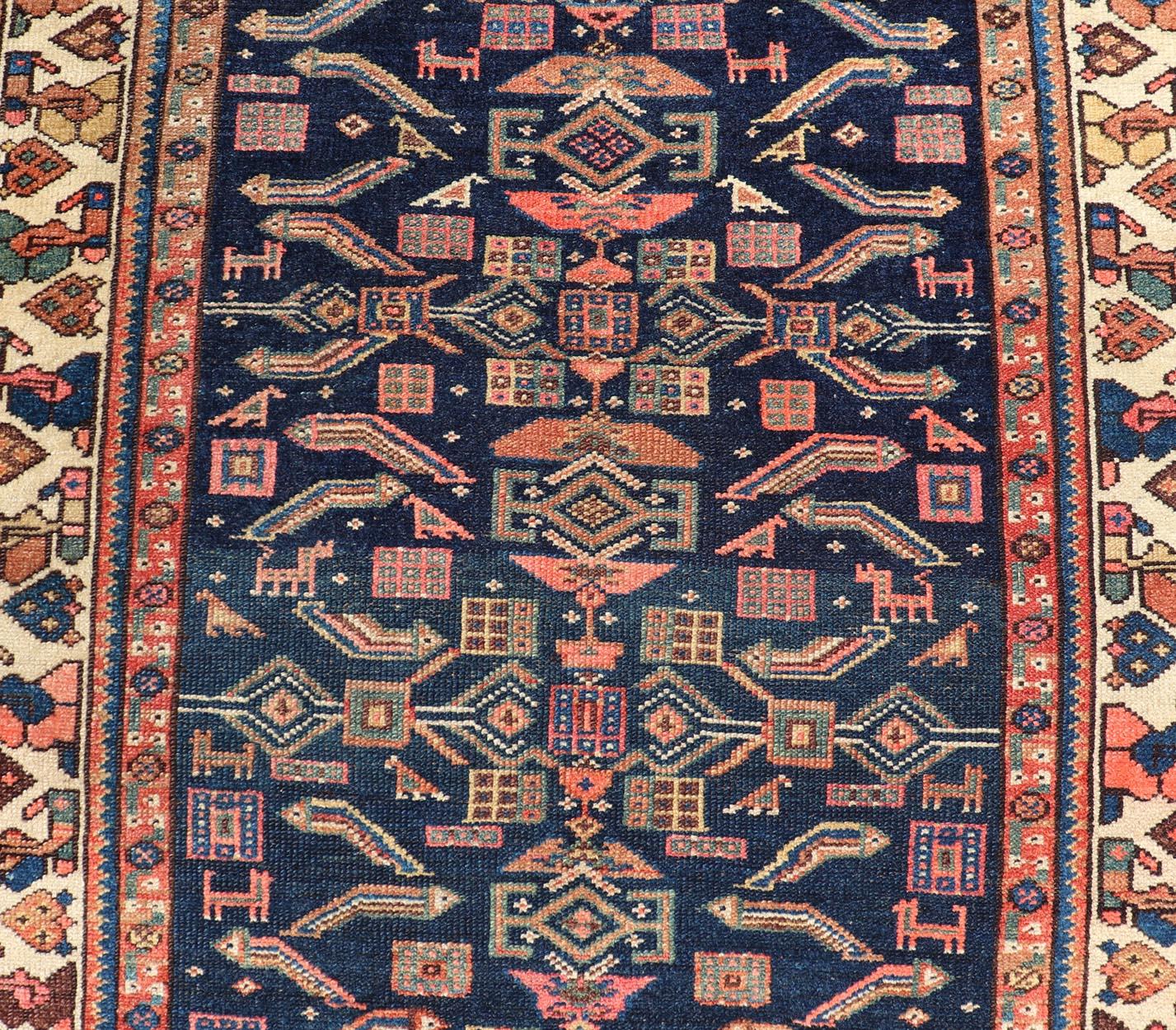 Antique Kurdish Rug With All-Over Geometric Design on a Blue Background For Sale 1