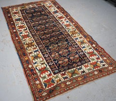Antique Kurdish rug with colourful shrub design.  Circa 1900