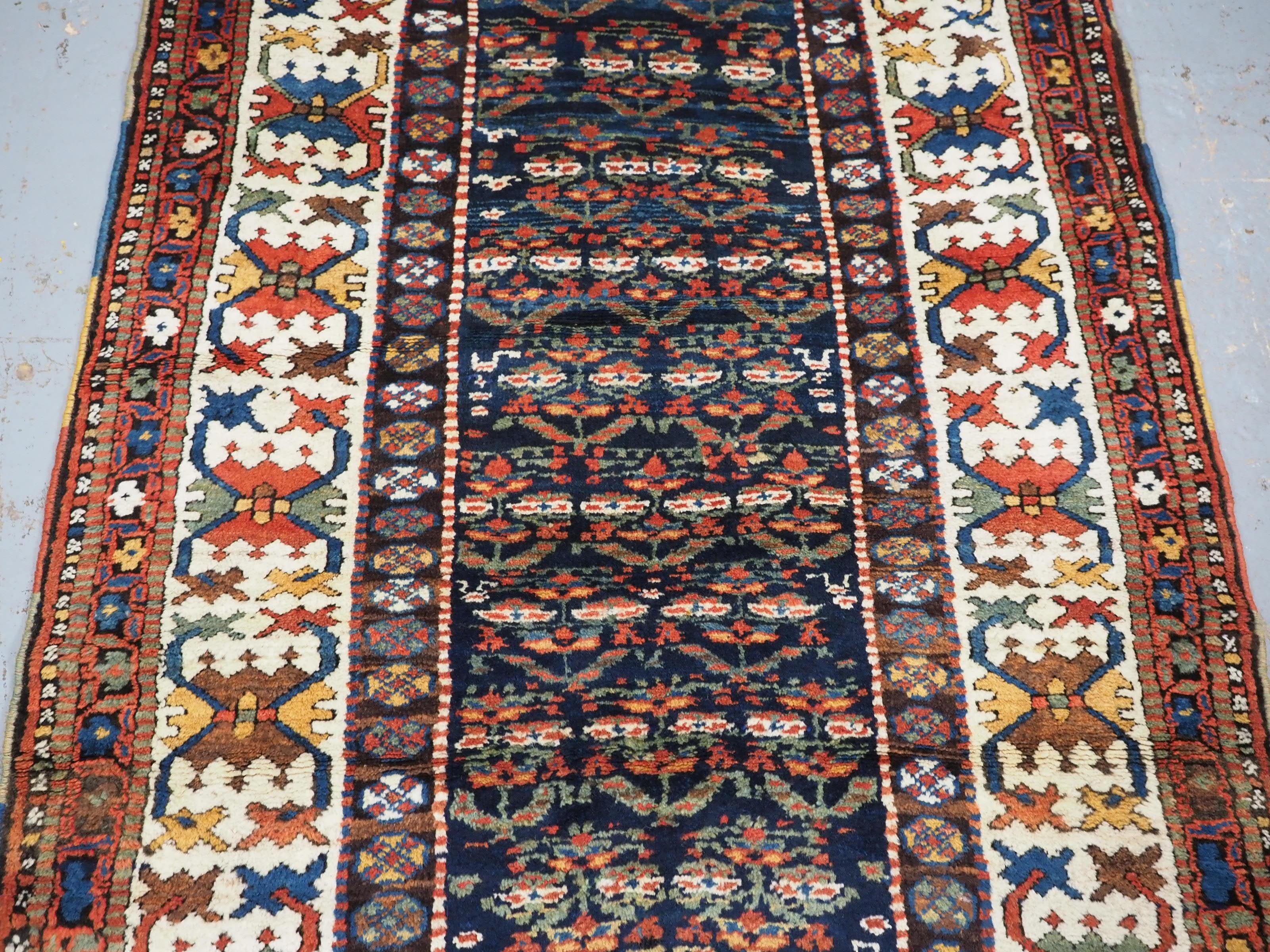 Antique Kurdish rug with colourful shrub design.  Circa 1900 In Good Condition For Sale In Moreton-In-Marsh, GB