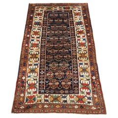 Antique Kurdish rug with colourful shrub design.  Circa 1900