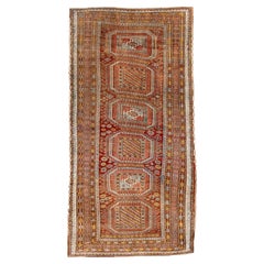 Antique Kurdish Rug with Octagonal Medallions in Warm Earth Tones
