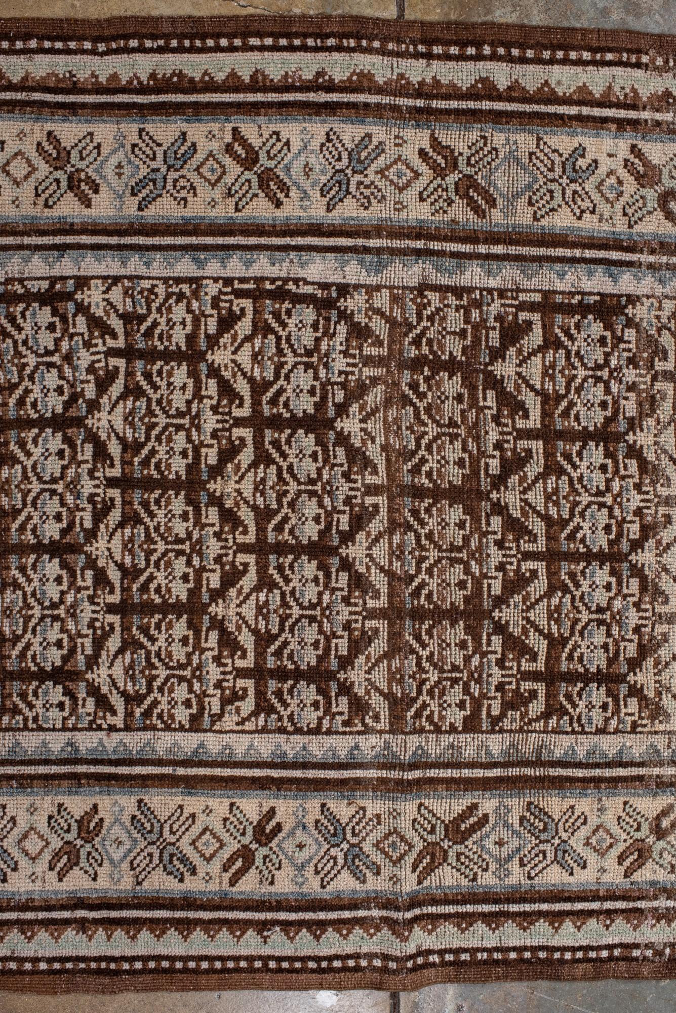 20th Century Antique Kurdish Rug with Repeating Tree Motif in Earth Tones For Sale