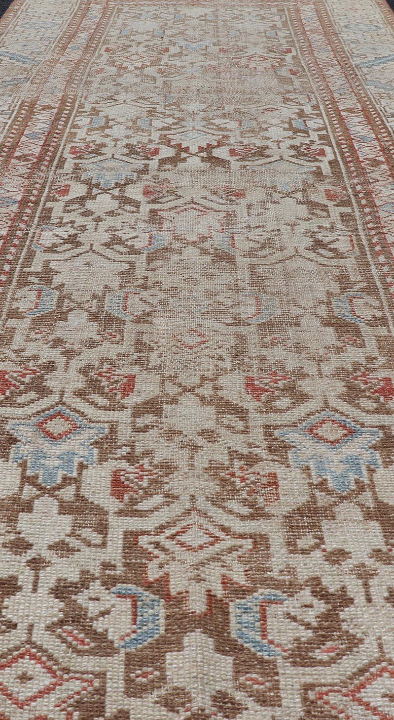Hand-Knotted Antique Kurdish Runner in Soft Tones in Wool with All-Over Tribal Design For Sale