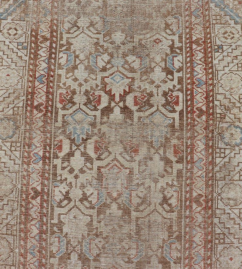 Antique Kurdish Runner in Soft Tones in Wool with All-Over Tribal Design In Good Condition For Sale In Atlanta, GA