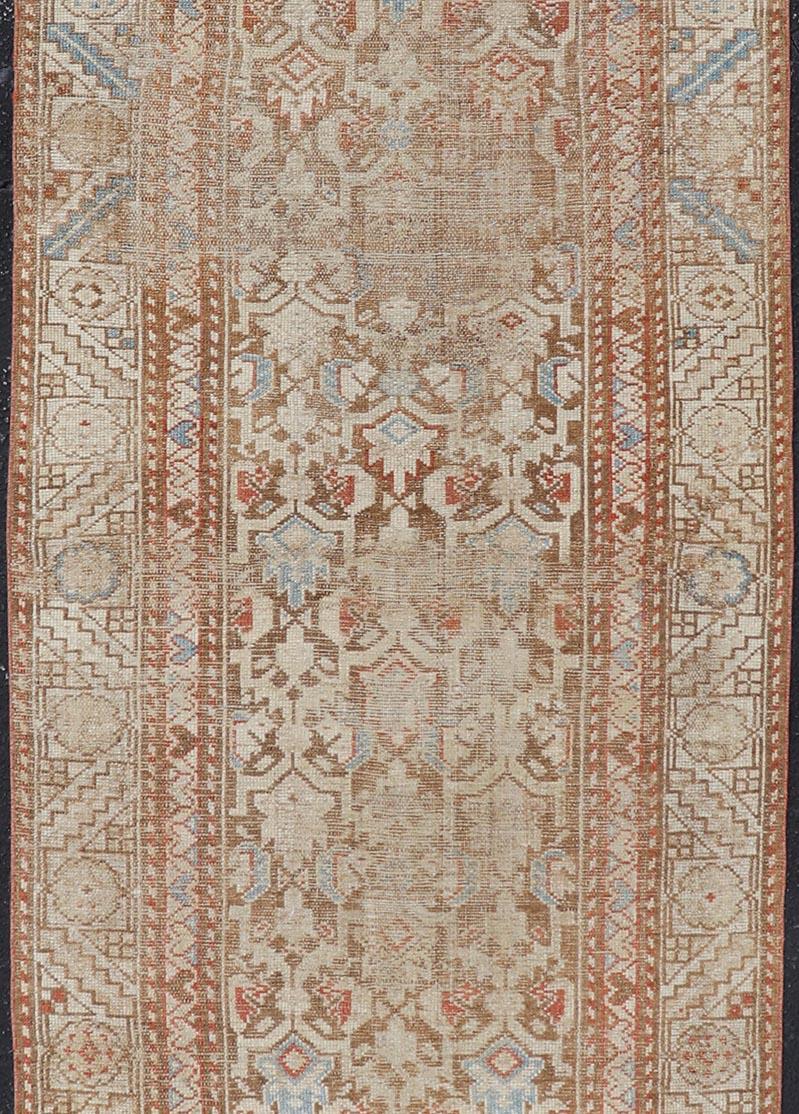 Antique Kurdish Runner in Soft Tones in Wool with All-Over Tribal Design For Sale 1