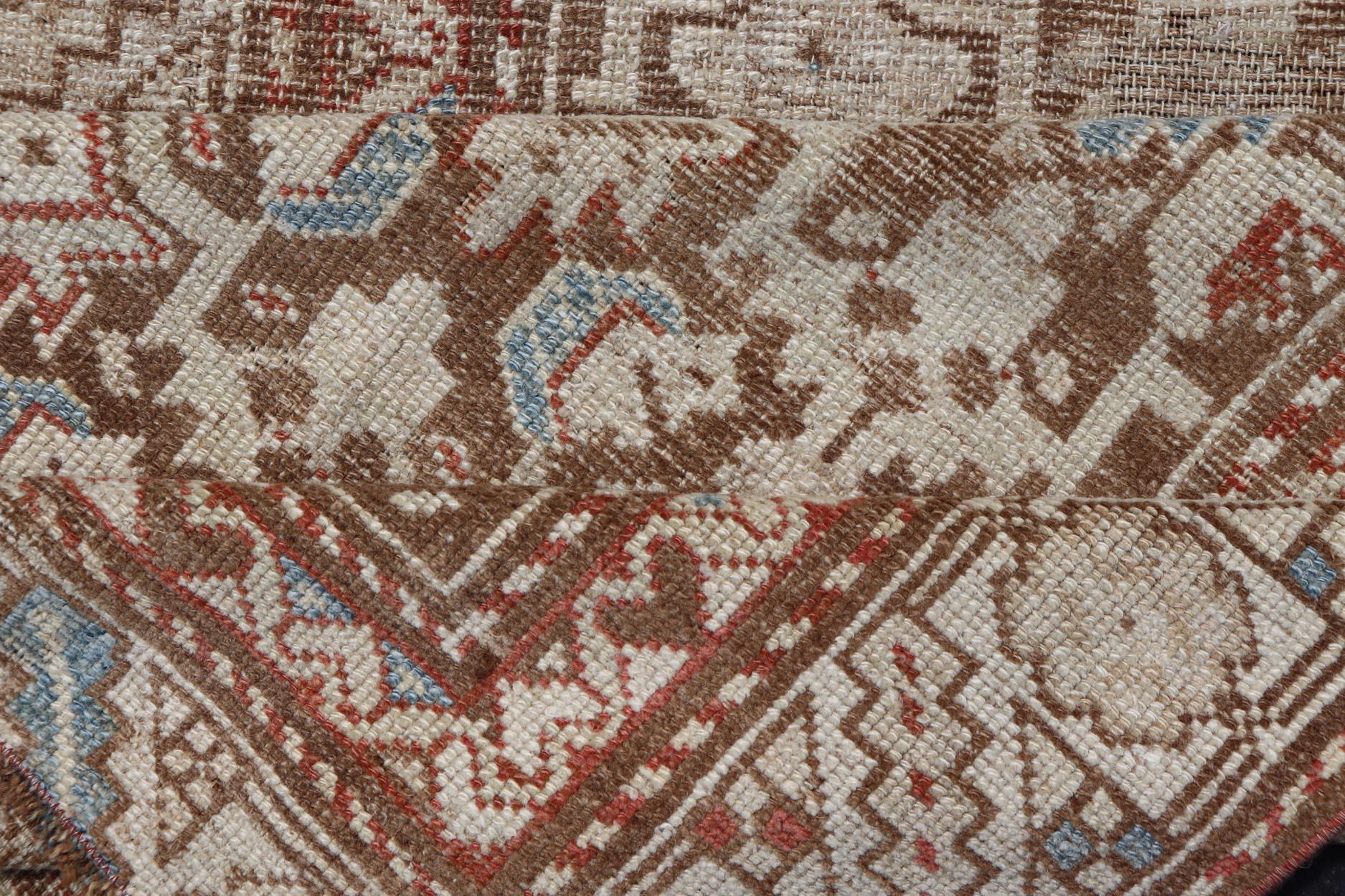 Antique Kurdish Runner in Soft Tones in Wool with All-Over Tribal Design For Sale 2