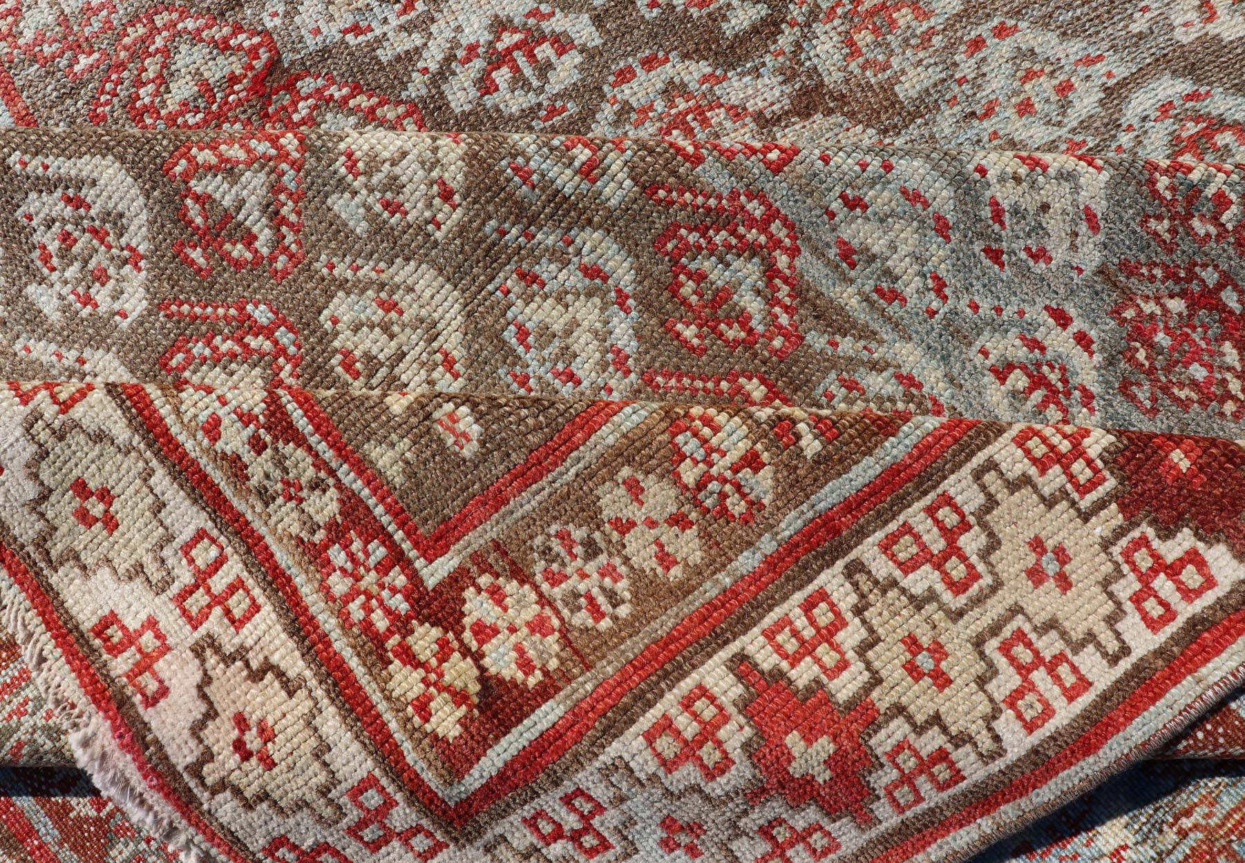 Antique Kurdish Runner in Soft Tones in Wool with Sub-Geometric Paisley Design For Sale 4